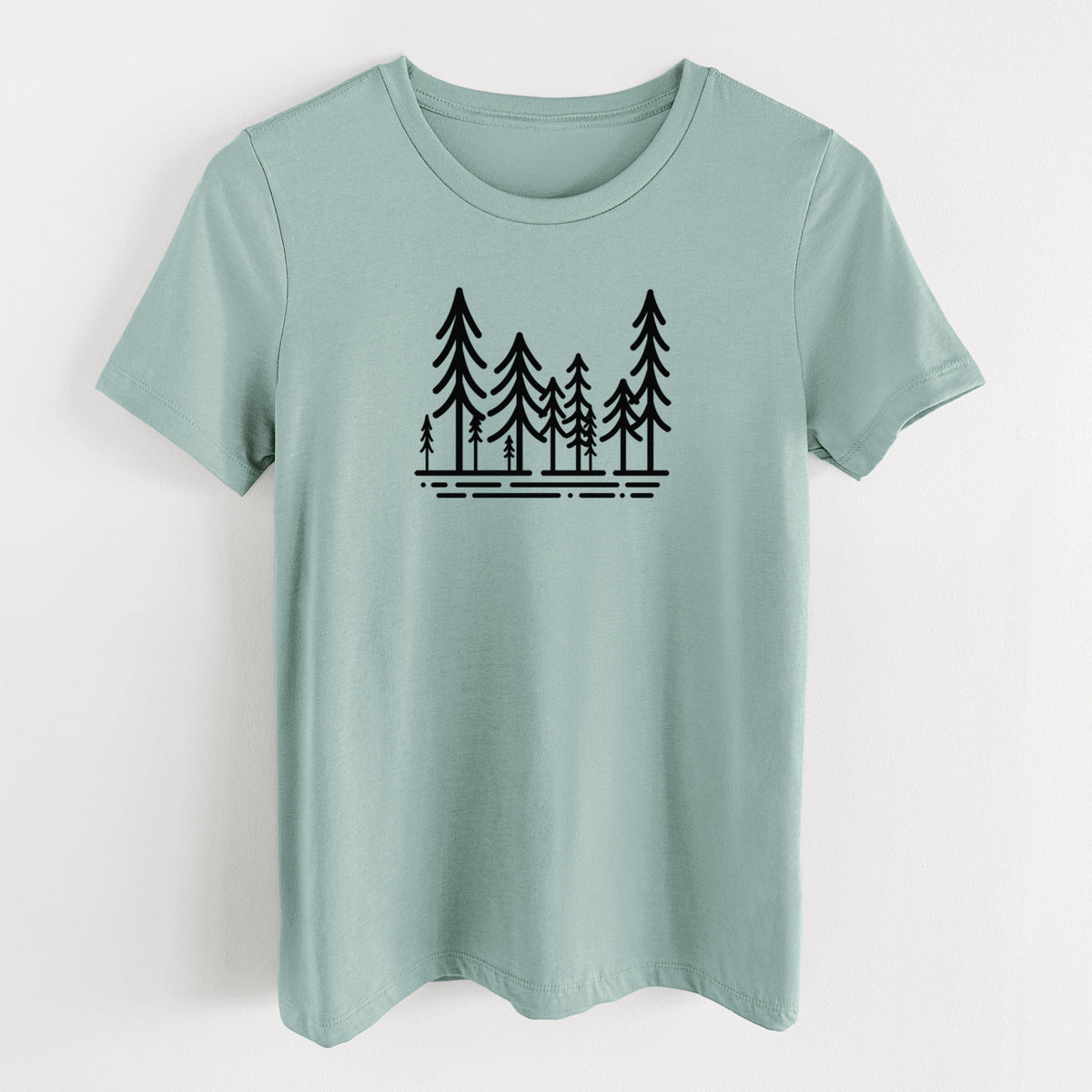 Dusty blue women's relaxed fit cotton t-shirt laid flat, printed with bold black line art of ten simple pine trees above horizontal lines.