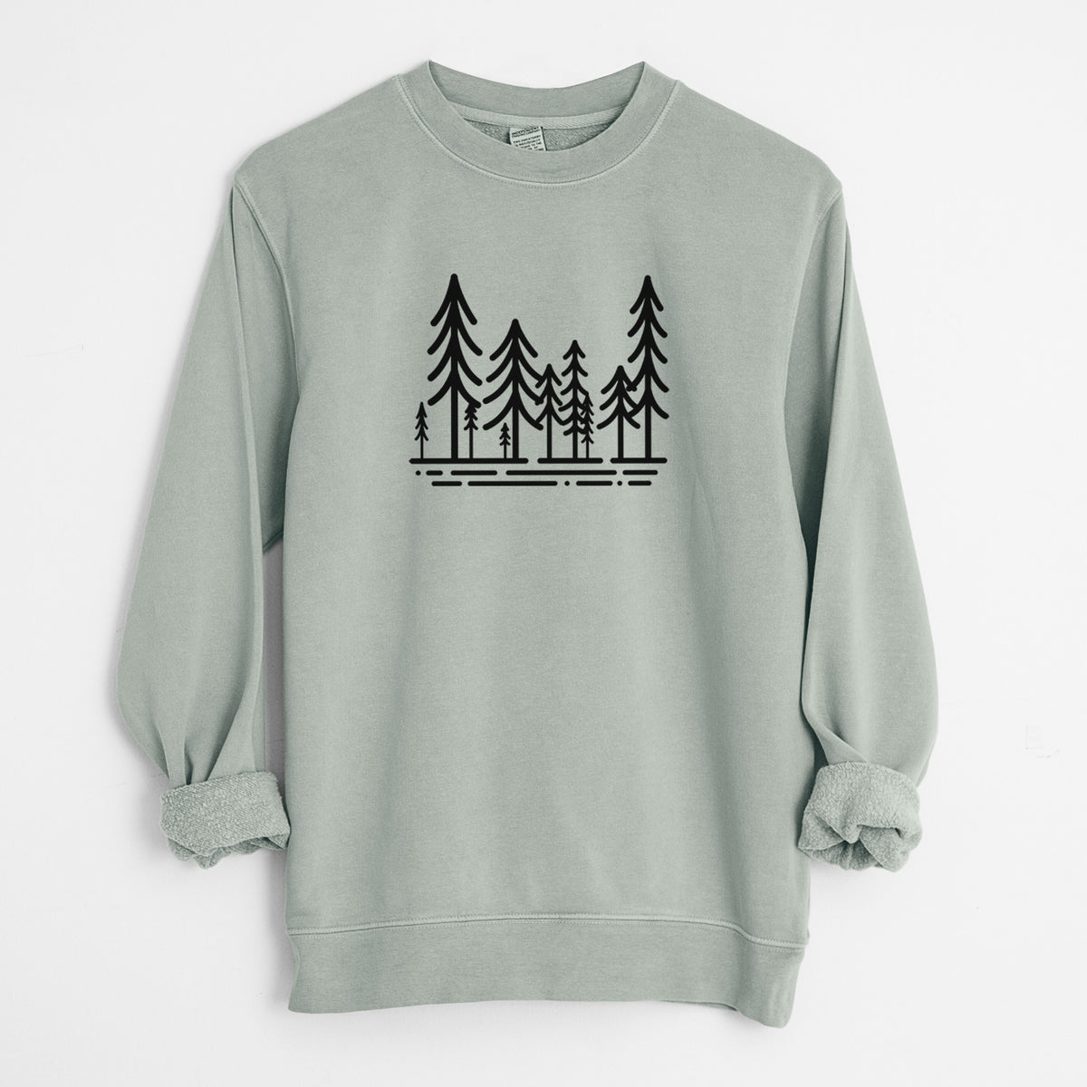Sage green pigment dyed crewneck sweatshirt laid flat with the sleeves rolled, printed with bold black line art of ten simple pine trees above horizontal lines.
