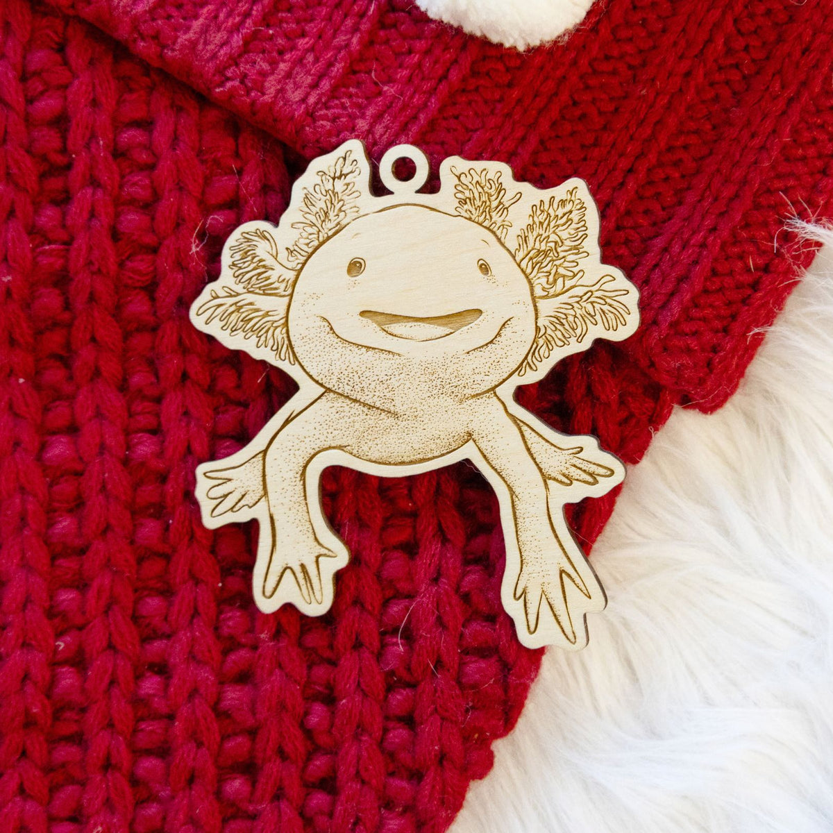 Product photo of the BeCause Tees Axolotl Wooden Ornament.