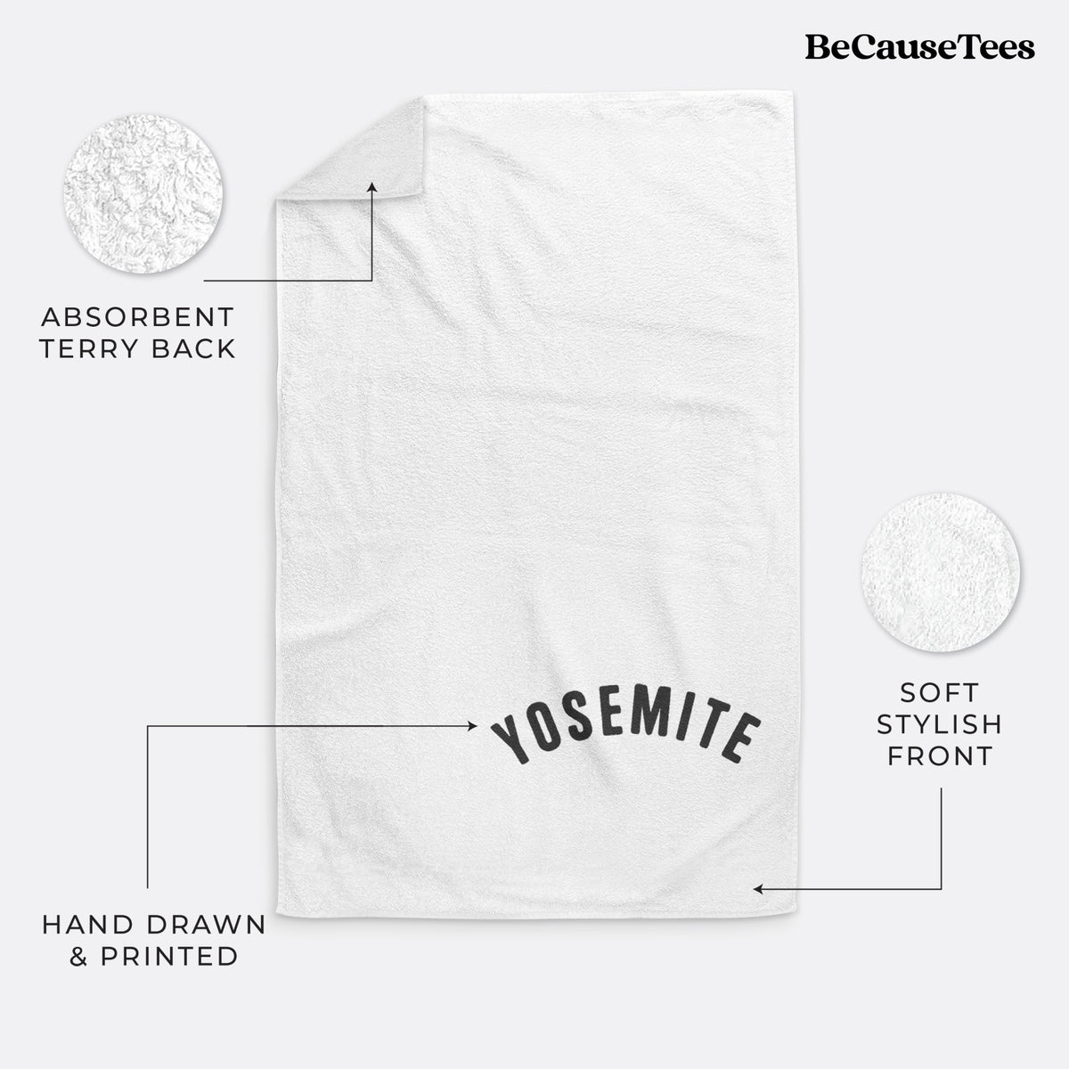 White hand towel printed with the word Yosemite in bold black letters arched across the chest.
