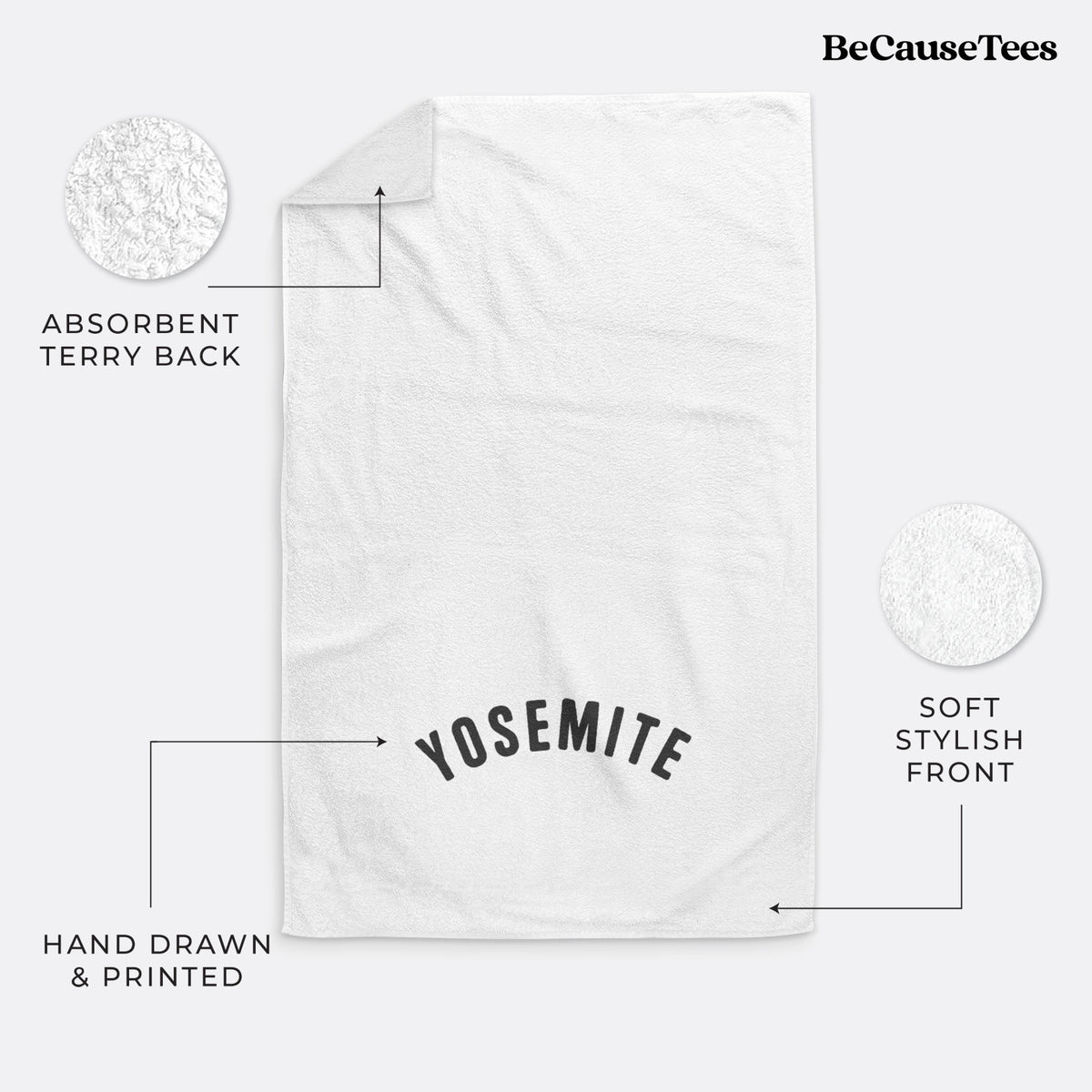 White hand towel printed with the word Yosemite in bold black letters arched across the chest.
