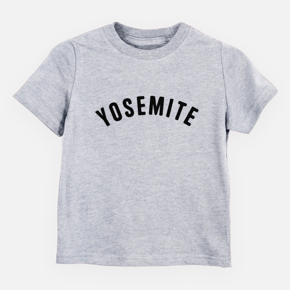 Heather grey toddler t-shirt laid flat, printed with the word Yosemite in bold black letters arched across the chest.