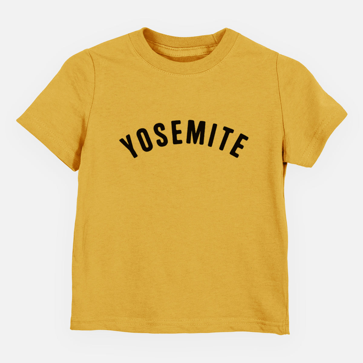 Honeycomb yellow toddler t-shirt laid flat, printed with the word Yosemite in bold black letters arched across the chest.