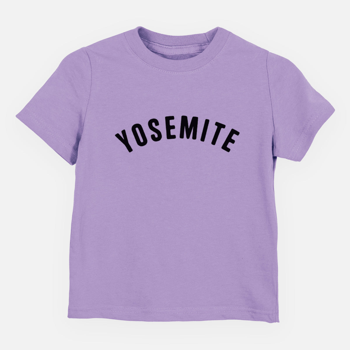 Lavender toddler t-shirt laid flat, printed with the word Yosemite in bold black letters arched across the chest.