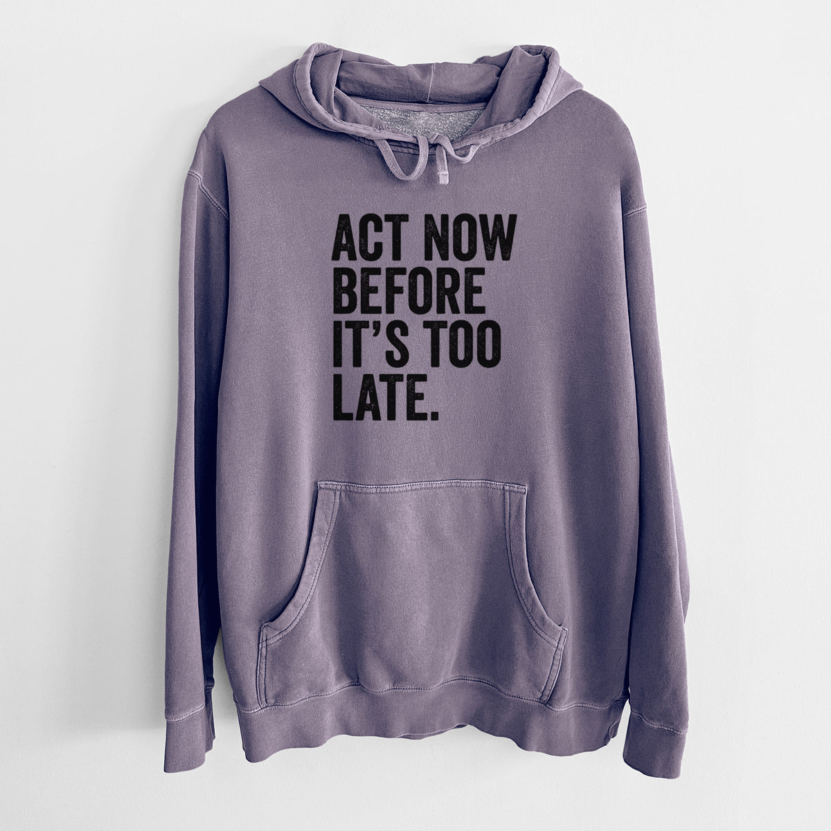 Plum purple pigment dyed hoodie laid flat, printed with bold black words reading Act Now Before It's Too Late.