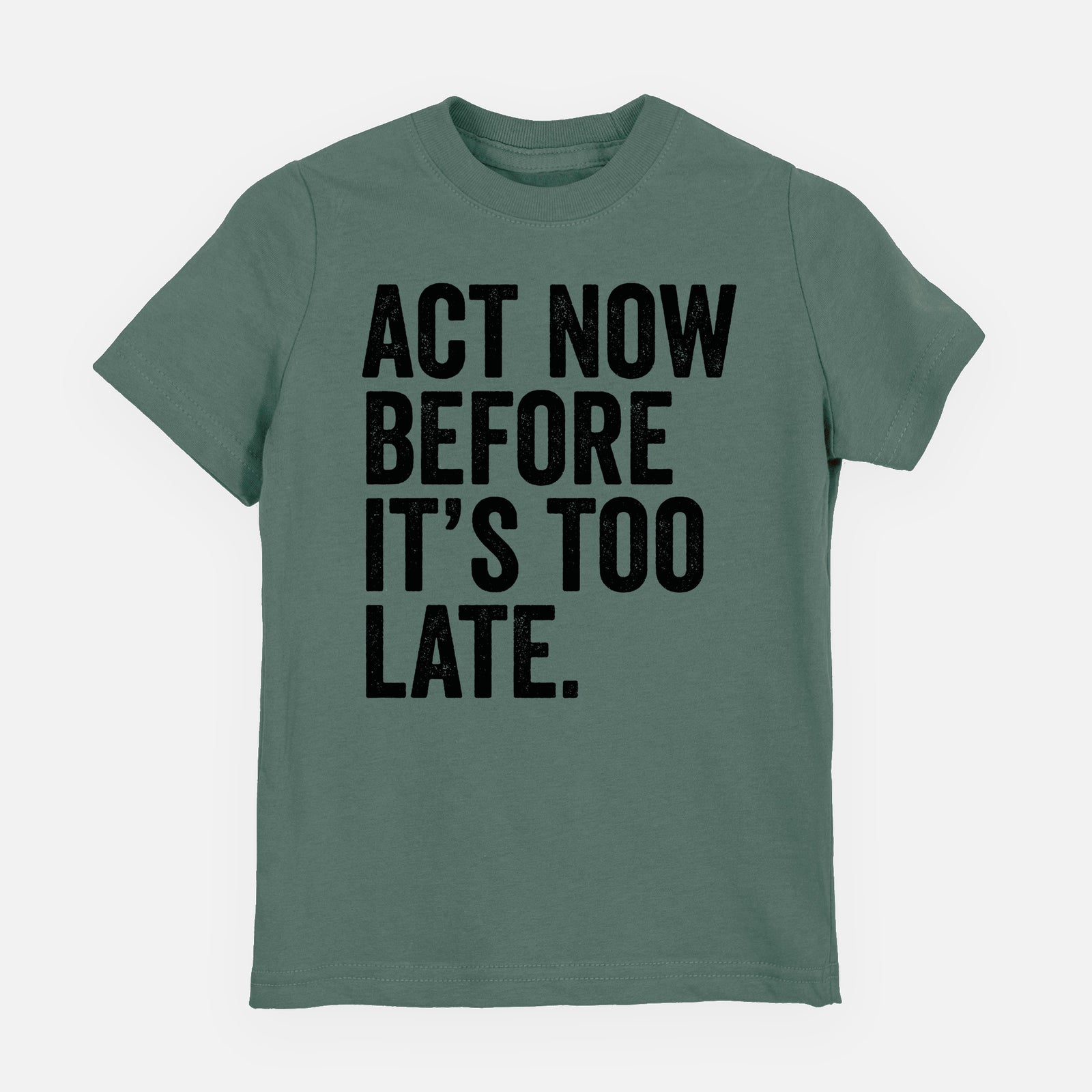 Basil green youth t-shirt laid flat, printed with bold black words reading Act Now Before It's Too Late.