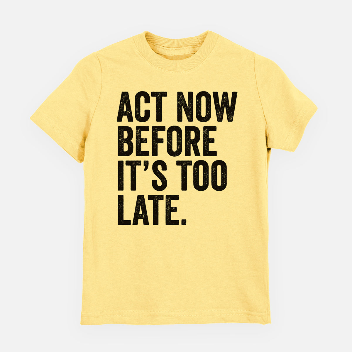 Butter yellow youth t-shirt laid flat, printed with bold black words reading Act Now Before It's Too Late.