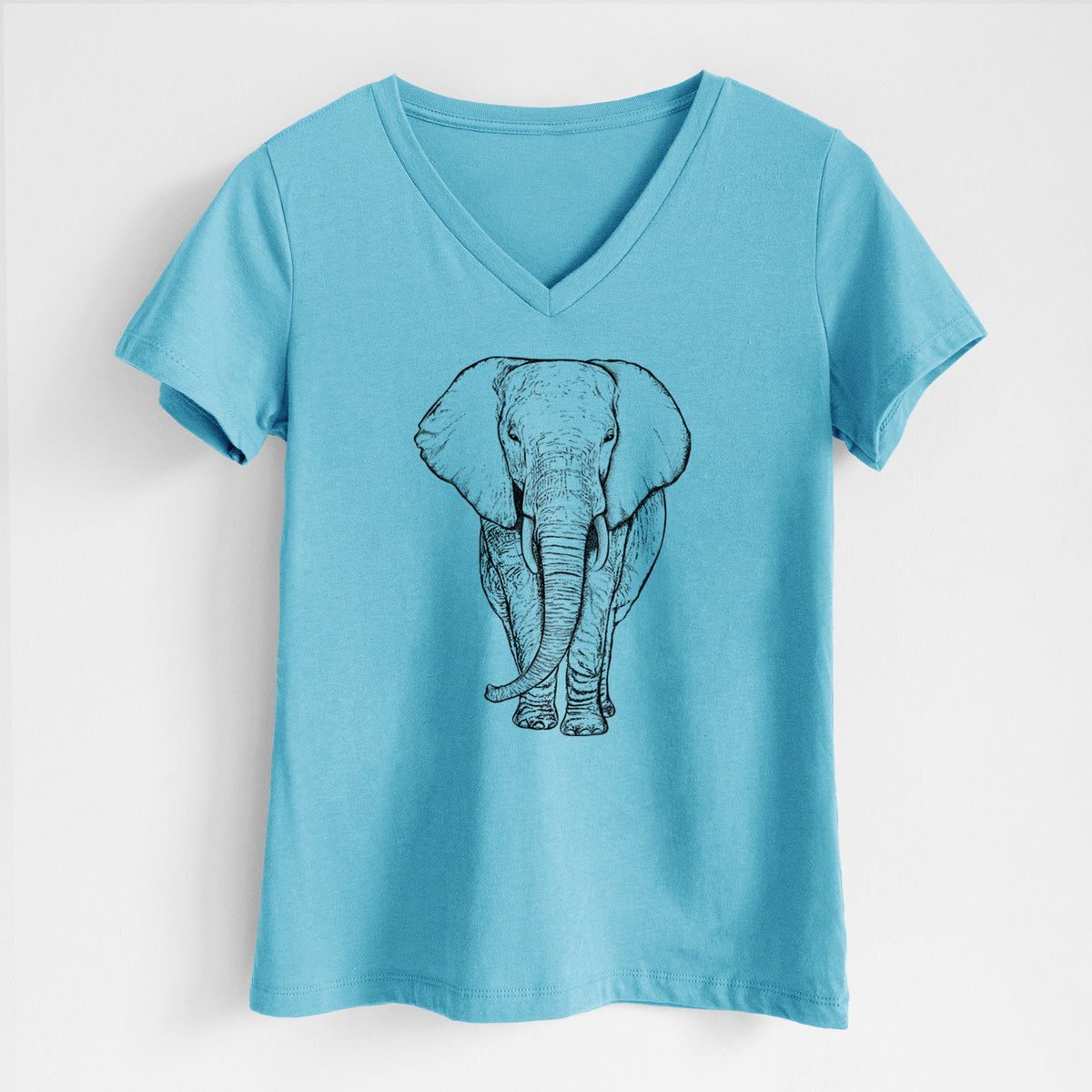 Turquoise women's relaxed fit cotton V-neck t-shirt laid flat, printed with a black ink line drawing of an African elephant facing forward with large ears and tusks.