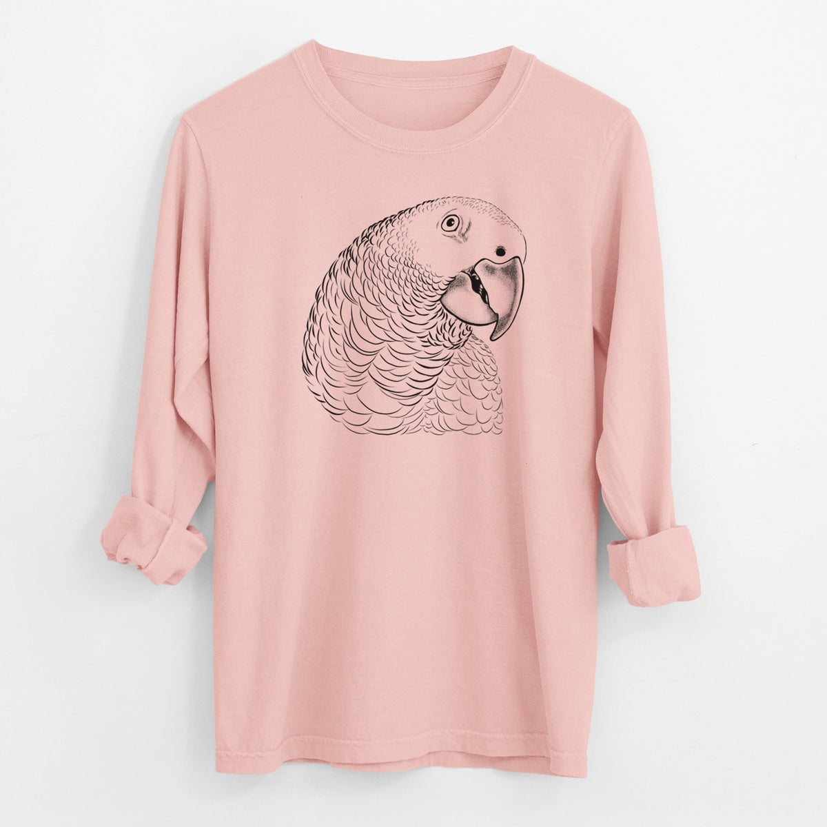 Peachy Comfort Colors long sleeve shirt laid flat with the cuffs rolled, printed with a detailed black ink portrait of an African grey parrot's head.