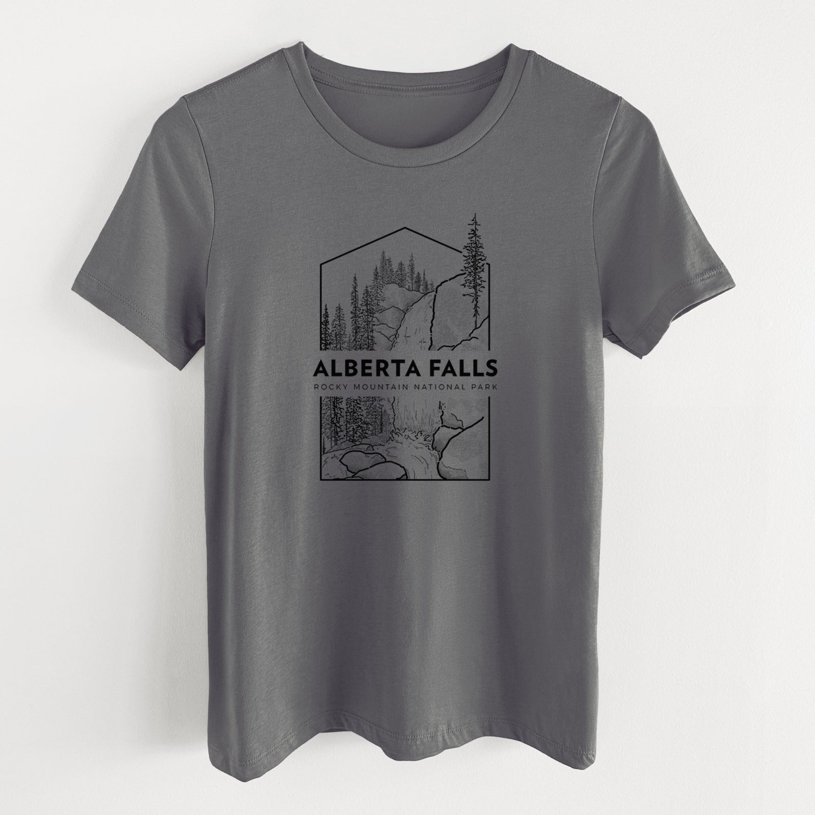 Asphalt women's relaxed fit cotton t-shirt laid flat, printed with a black line art badge of Alberta Falls with pine trees, with the words Alberta Falls, Rocky Mountain National Park.