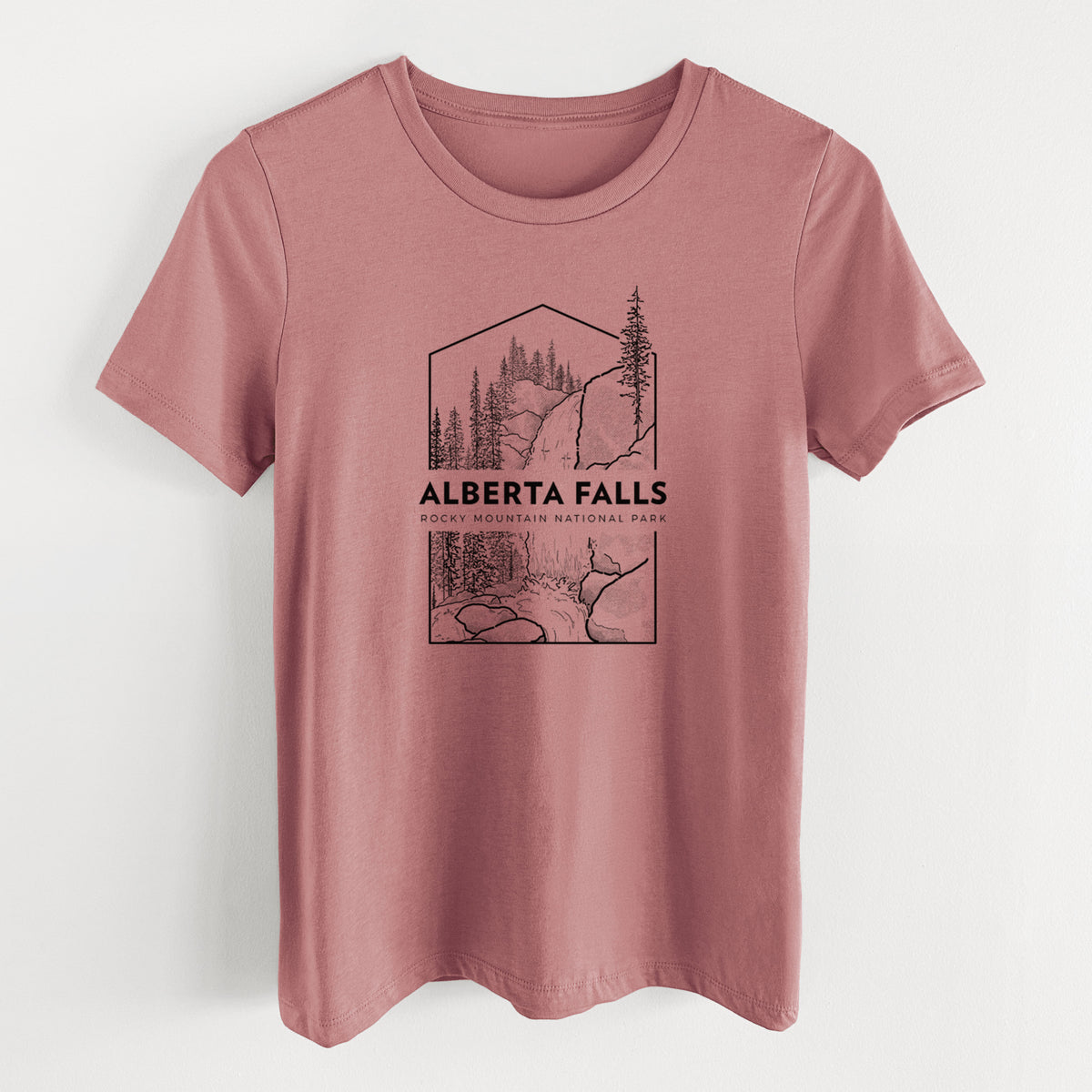 Mauve pink women's relaxed fit cotton t-shirt laid flat, printed with a black line art badge of Alberta Falls with pine trees, with the words Alberta Falls, Rocky Mountain National Park.
