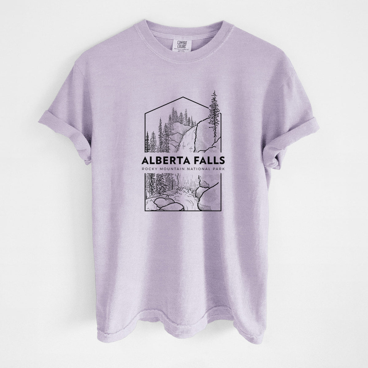 Orchid purple Comfort Colors t-shirt laid flat, printed with a black line art badge of Alberta Falls with pine trees, with the words Alberta Falls, Rocky Mountain National Park.