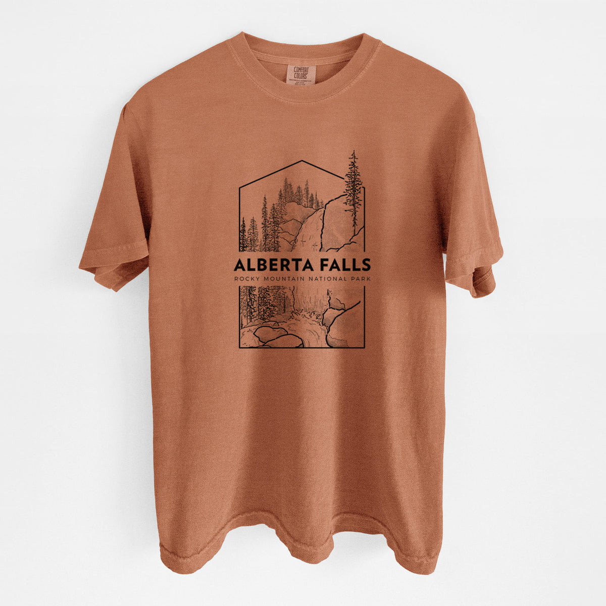 Yam burnt orange Comfort Colors t-shirt laid flat, printed with a black line art badge of Alberta Falls with pine trees, with the words Alberta Falls, Rocky Mountain National Park.