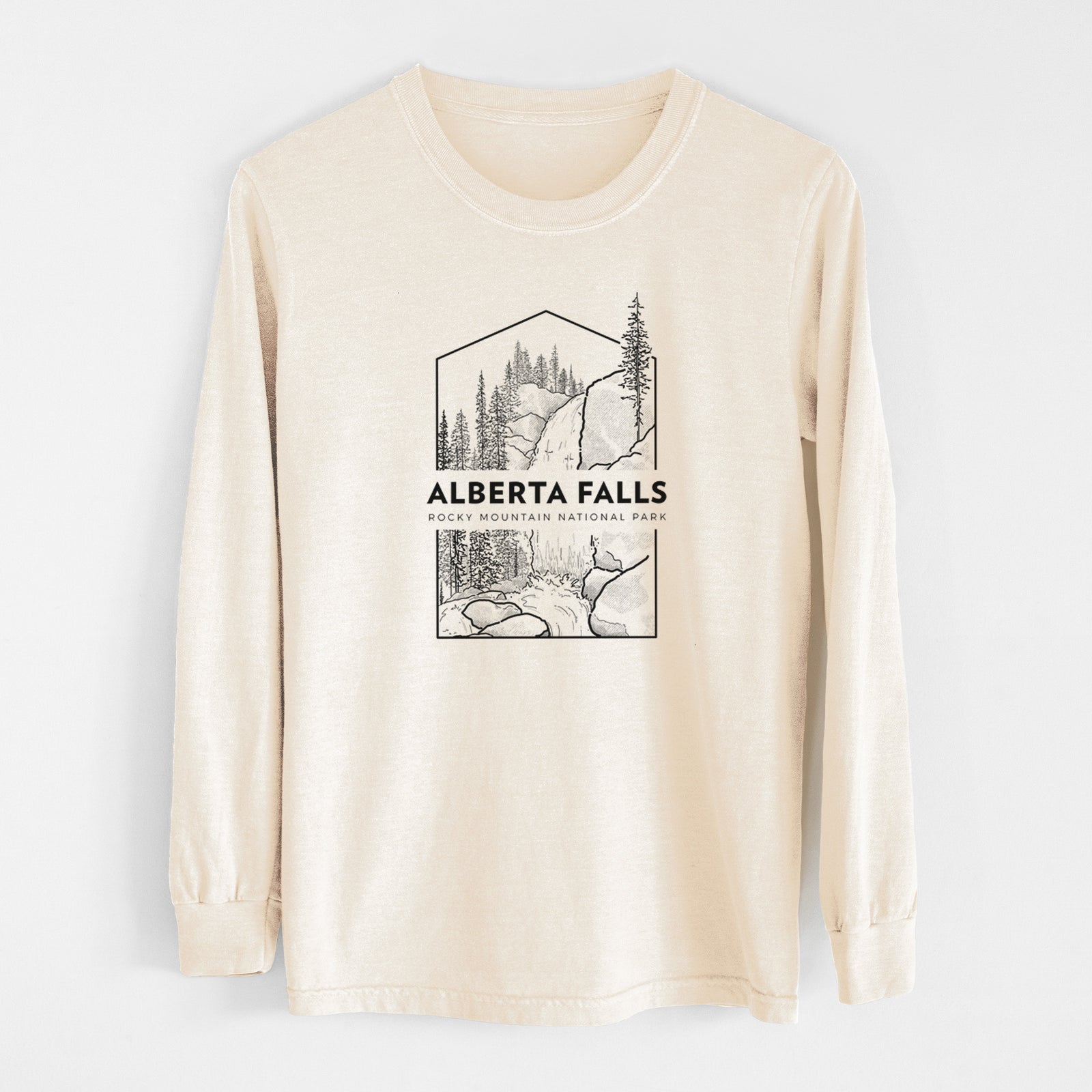 Ivory Comfort Colors long sleeve shirt laid flat, printed with a black line art badge of Alberta Falls with pine trees, with the words Alberta Falls, Rocky Mountain National Park.