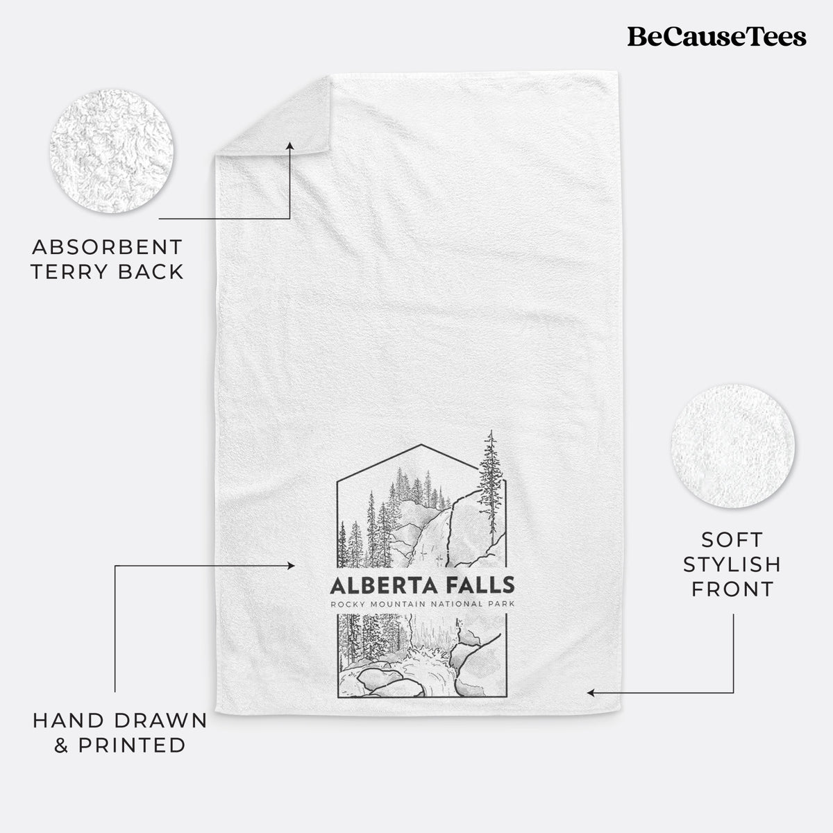 White hand towel printed with a black line art badge of Alberta Falls with pine trees, with the words Alberta Falls, Rocky Mountain National Park.