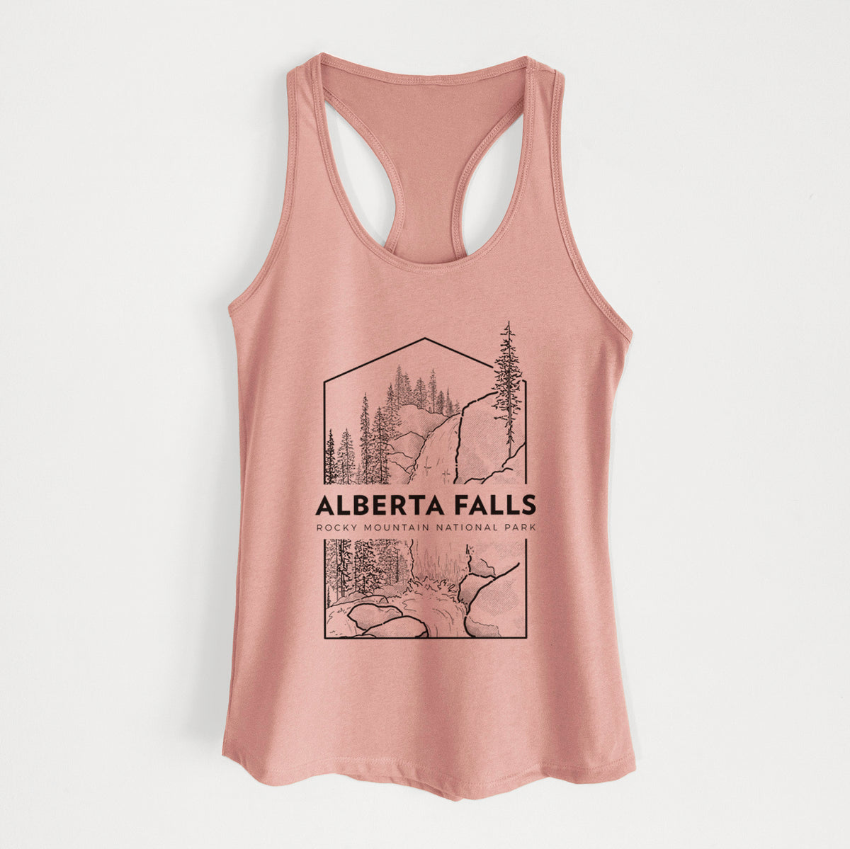 Desert pink women's racerback tank top laid flat, printed with a black line art badge of Alberta Falls with pine trees, with the words Alberta Falls, Rocky Mountain National Park.