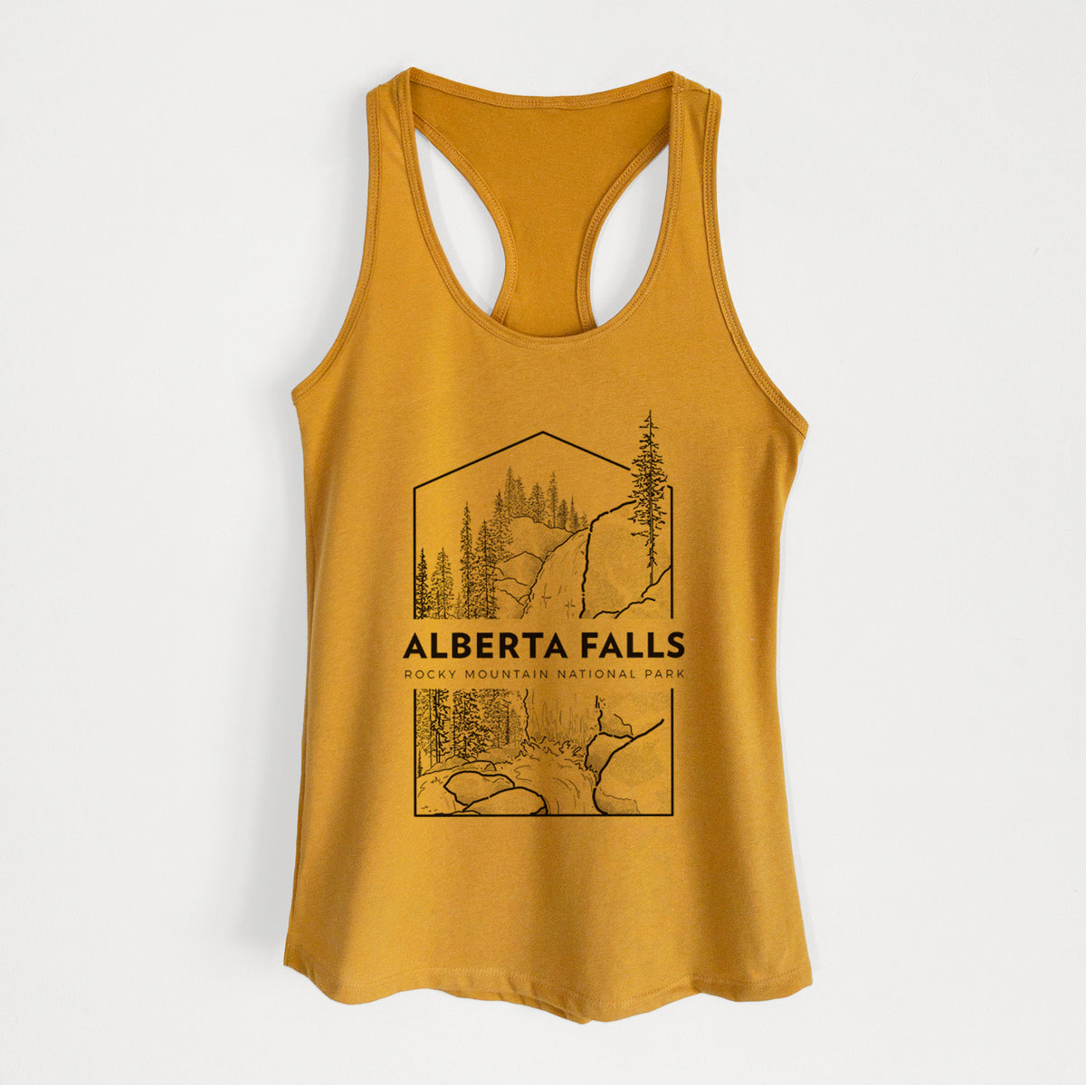Gold women's racerback tank top laid flat, printed with a black line art badge of Alberta Falls with pine trees, with the words Alberta Falls, Rocky Mountain National Park.