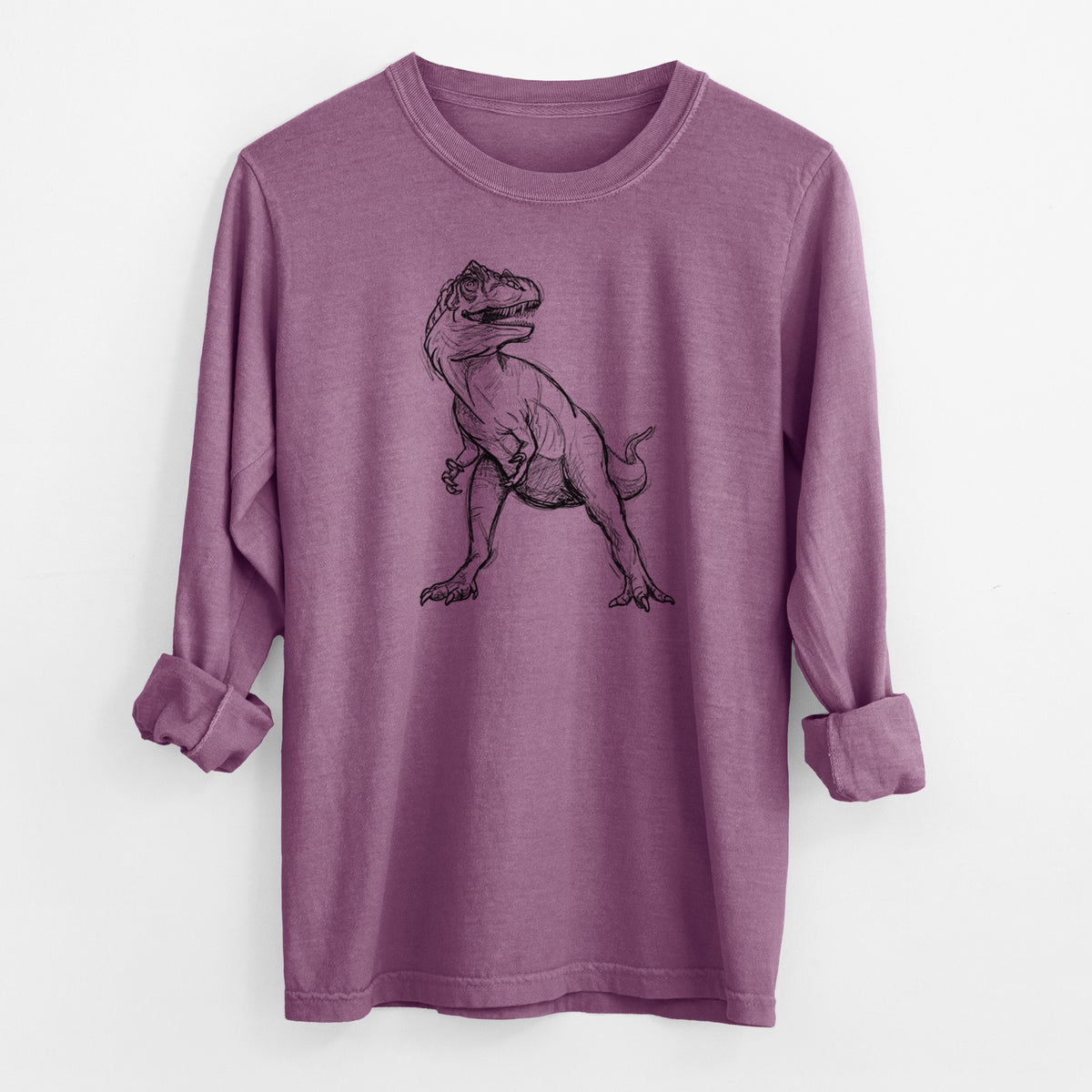 Berry pink Comfort Colors long sleeve shirt laid flat with the cuffs rolled, printed with a black ink illustration of an Allosaurus walking.