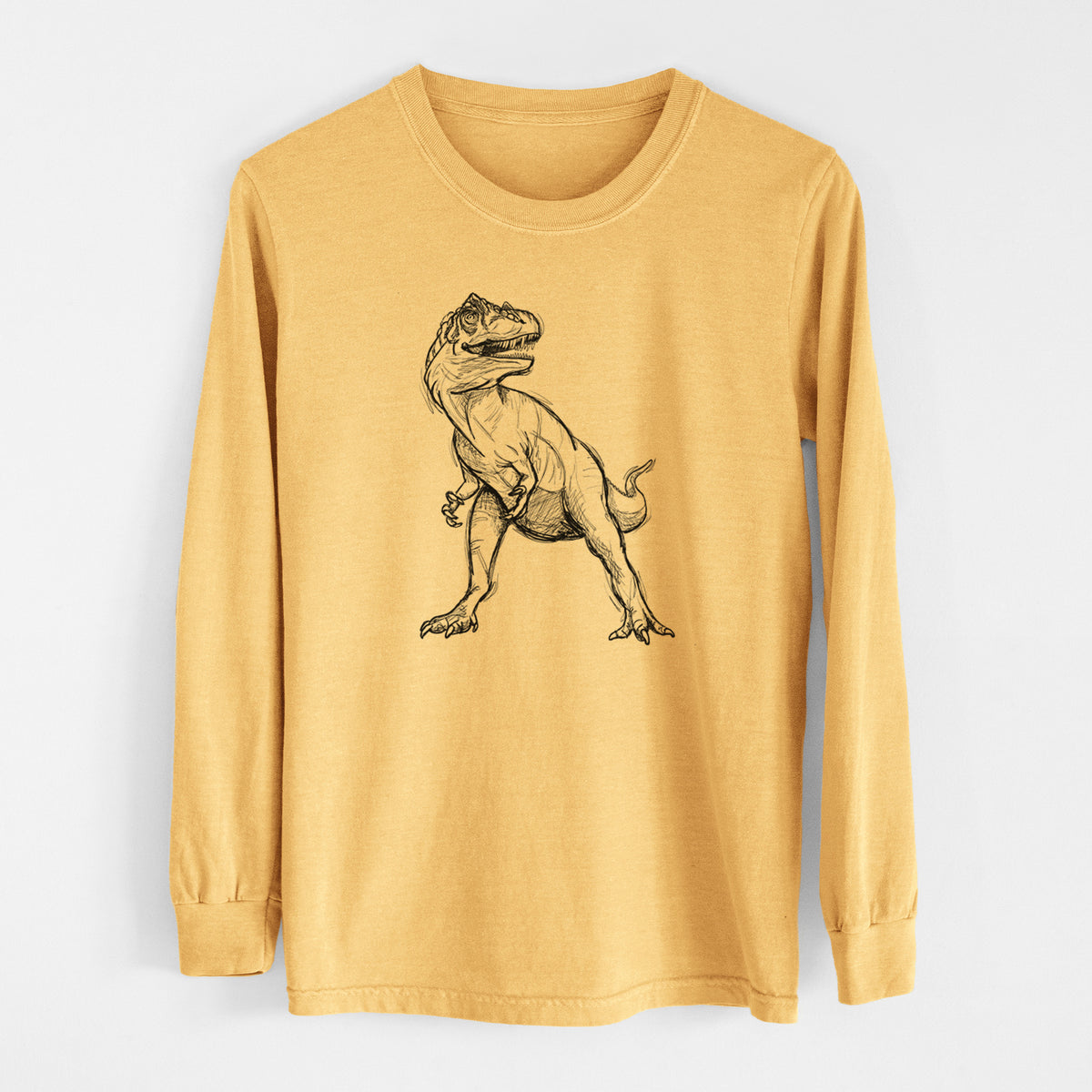 Golden wheat yellow Comfort Colors long sleeve shirt laid flat, printed with a black ink illustration of an Allosaurus walking.