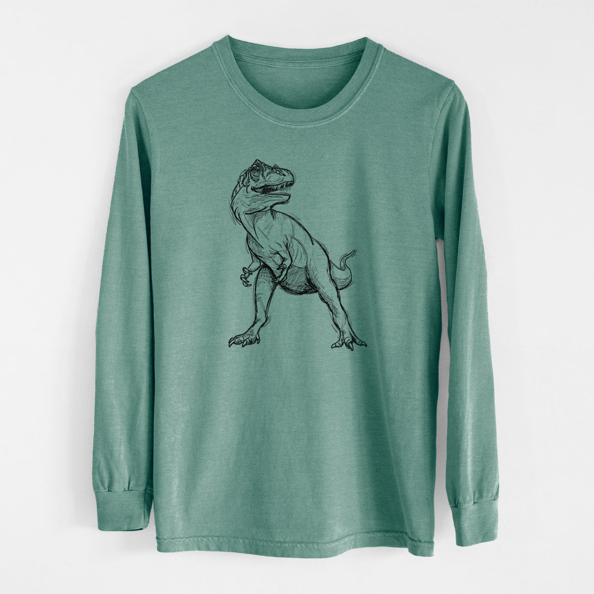 Pine green Comfort Colors long sleeve shirt laid flat, printed with a black ink illustration of an Allosaurus walking.