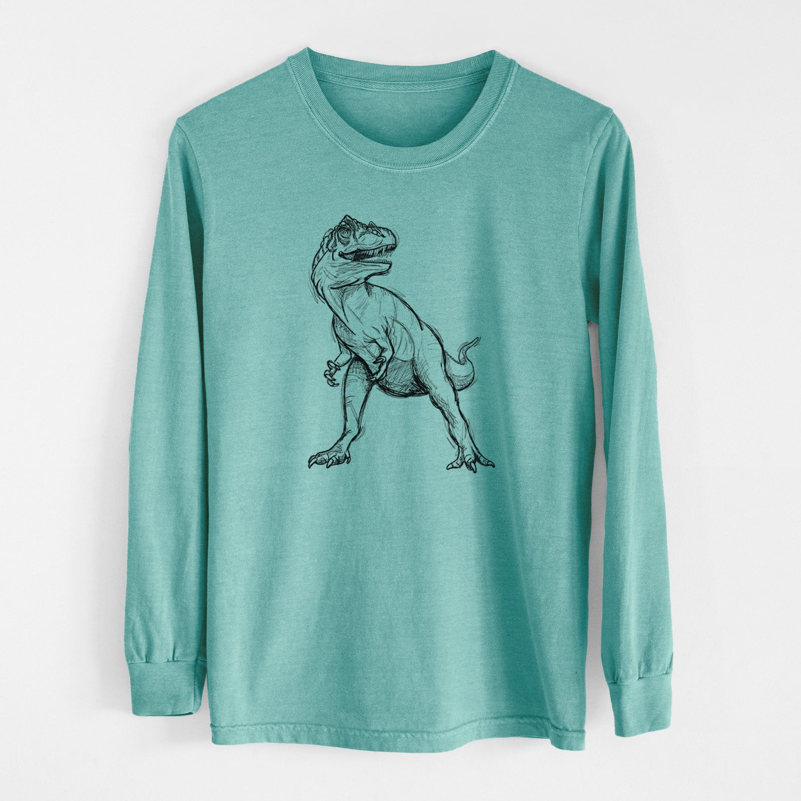 Reef green Comfort Colors long sleeve shirt laid flat, printed with a black ink illustration of an Allosaurus walking.