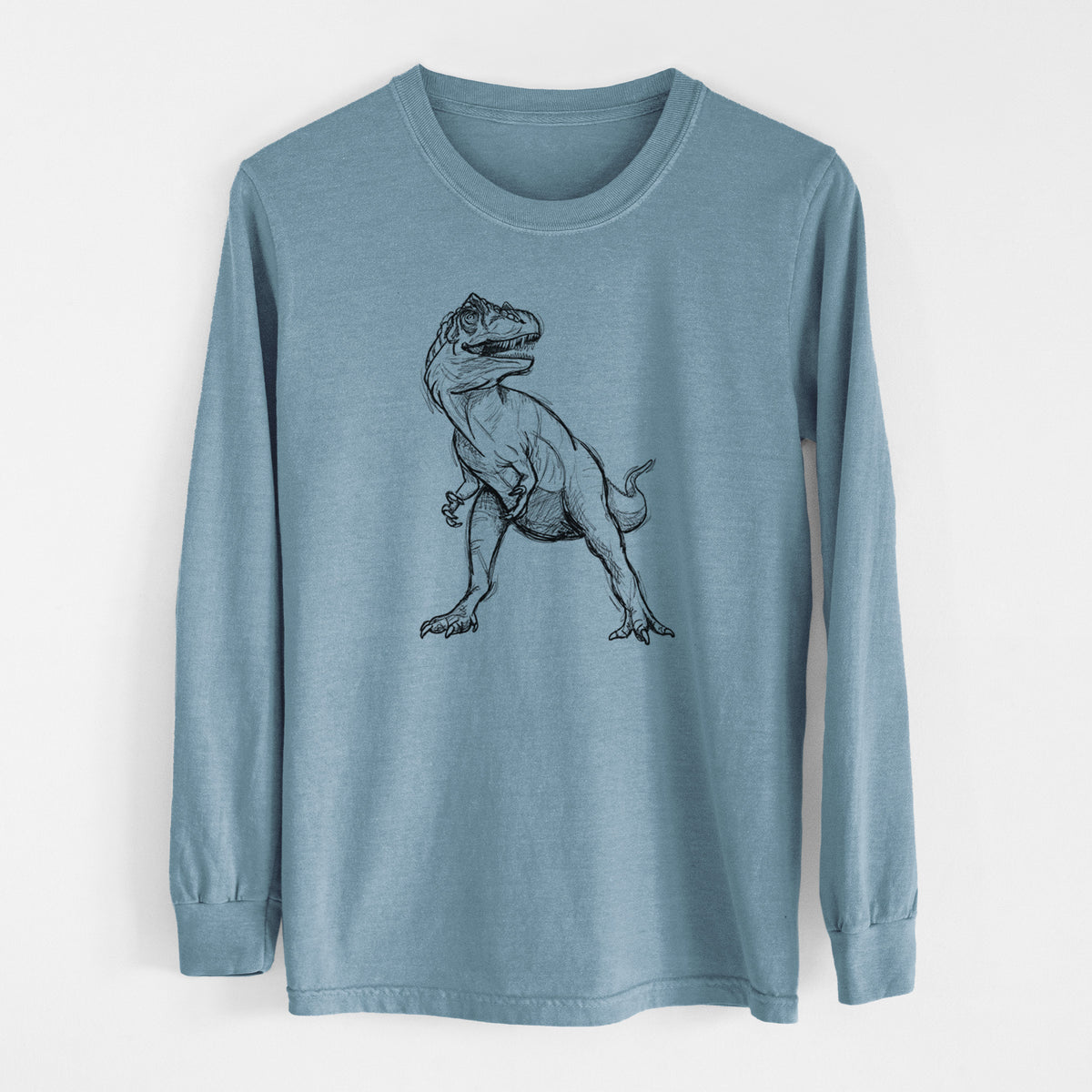 Steel blue Comfort Colors long sleeve shirt laid flat, printed with a black ink illustration of an Allosaurus walking.