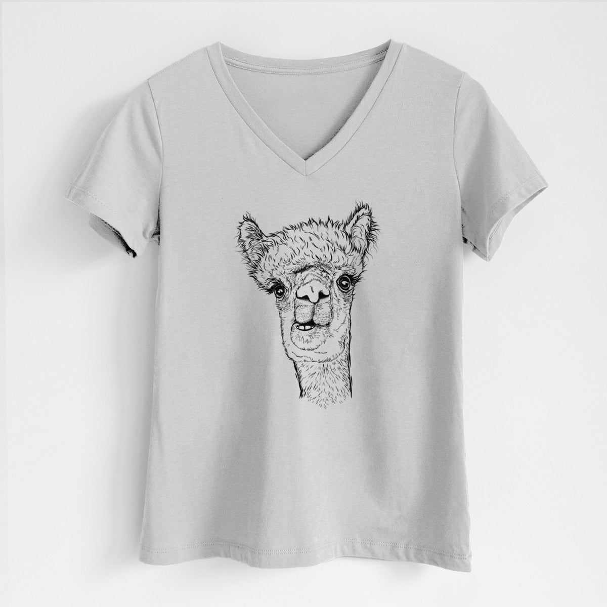 Lunar grey women's relaxed fit cotton V-neck t-shirt laid flat, printed with a detailed black ink portrait of a fluffy alpaca's head and neck.