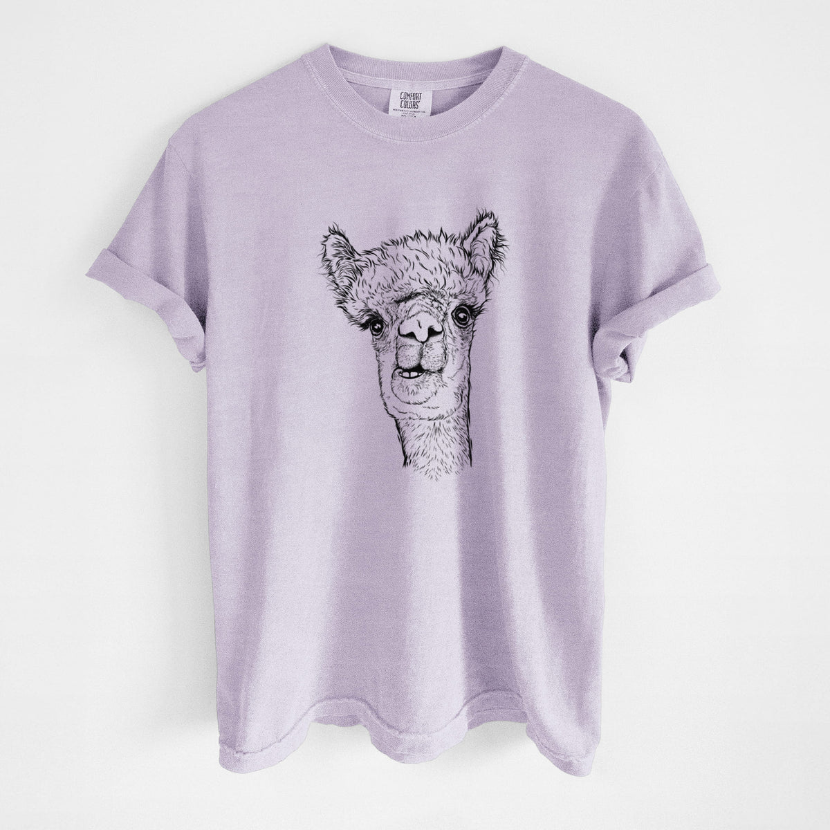 Orchid purple Comfort Colors t-shirt laid flat, printed with a detailed black ink portrait of a fluffy alpaca's head and neck.