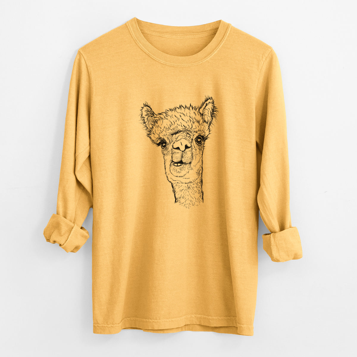 Golden wheat yellow Comfort Colors long sleeve shirt laid flat with the cuffs rolled, printed with a detailed black ink portrait of a fluffy alpaca's head and neck.