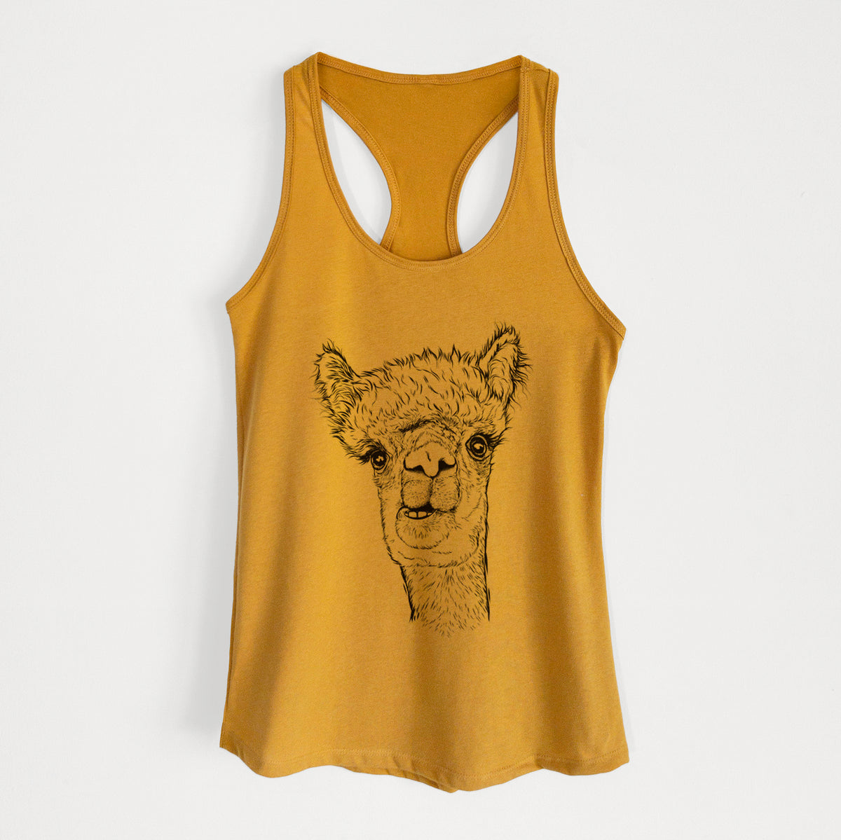 Gold women's racerback tank top laid flat, printed with a detailed black ink portrait of a fluffy alpaca's head and neck.