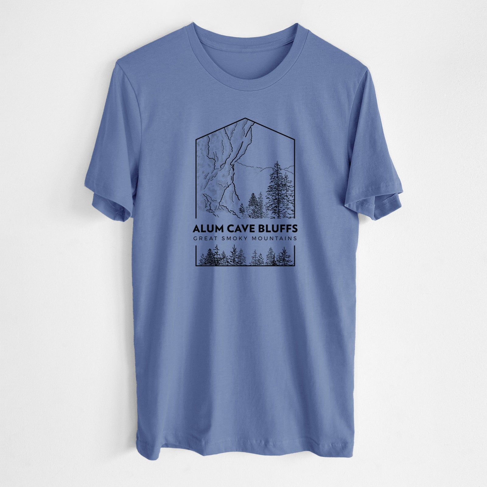 Blue bell lightweight cotton t-shirt laid flat, printed with a black line art badge of Alum Cave Bluffs with pine trees, with the words Alum Cave Bluffs, Great Smoky Mountains.