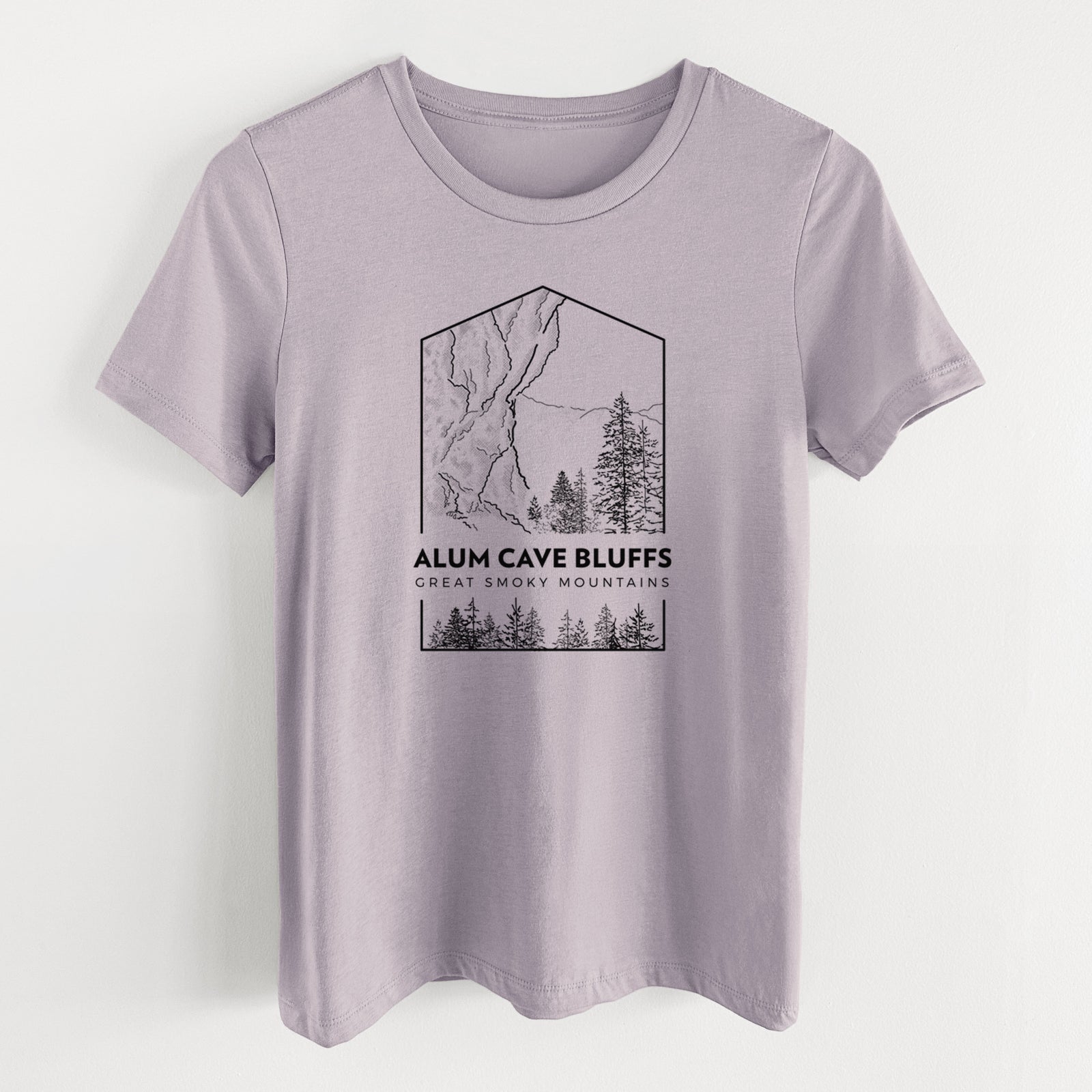 Light violet women's relaxed fit cotton t-shirt laid flat, printed with a black line art badge of Alum Cave Bluffs with pine trees, with the words Alum Cave Bluffs, Great Smoky Mountains.