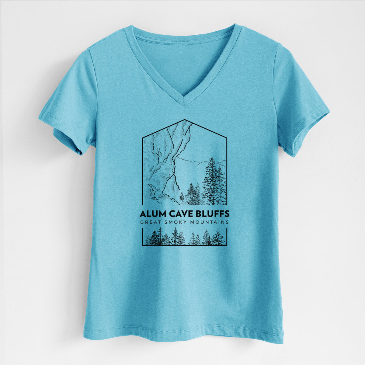 Turquoise women's relaxed fit cotton V-neck t-shirt laid flat, printed with a black line art badge of Alum Cave Bluffs with pine trees, with the words Alum Cave Bluffs, Great Smoky Mountains.
