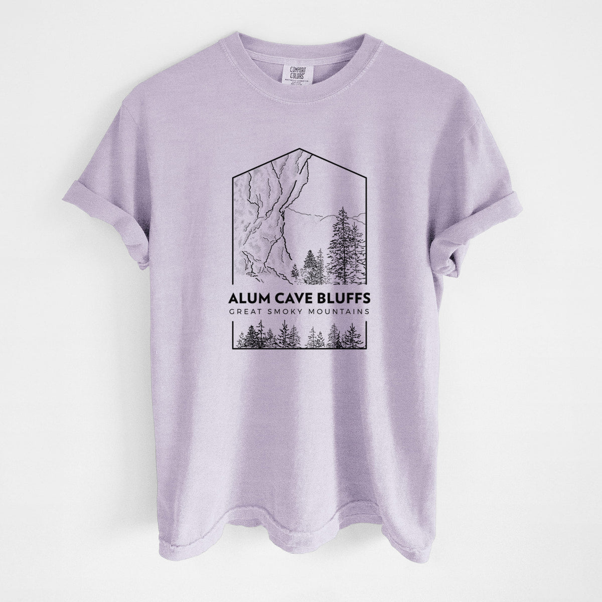 Orchid purple Comfort Colors t-shirt laid flat, printed with a black line art badge of Alum Cave Bluffs with pine trees, with the words Alum Cave Bluffs, Great Smoky Mountains.