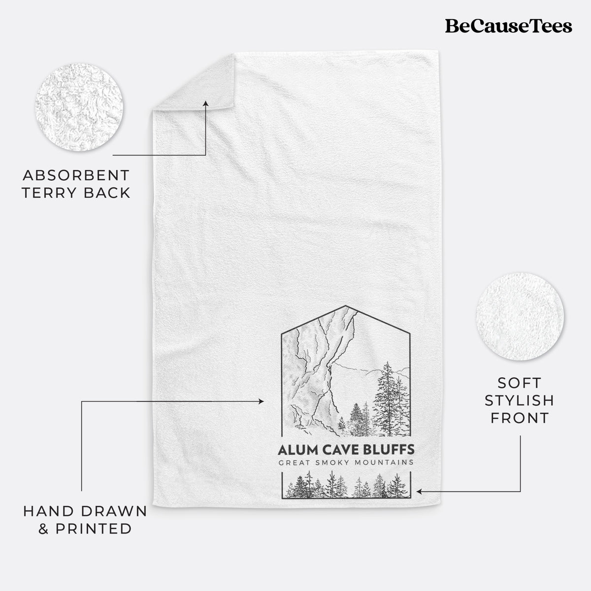 White hand towel printed with a black line art badge of Alum Cave Bluffs with pine trees, with the words Alum Cave Bluffs, Great Smoky Mountains.