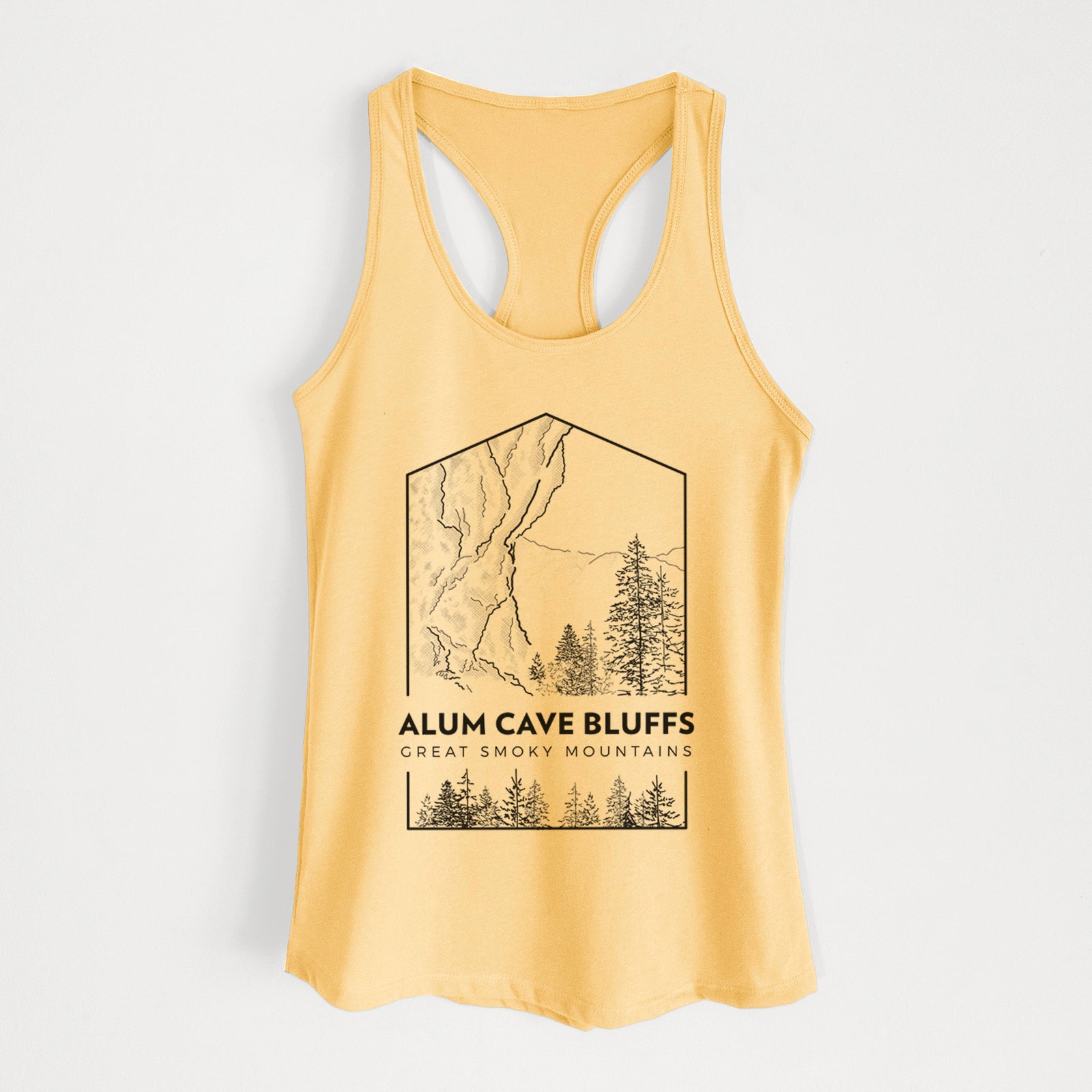 Banana cream women's racerback tank top laid flat, printed with a black line art badge of Alum Cave Bluffs with pine trees, with the words Alum Cave Bluffs, Great Smoky Mountains.