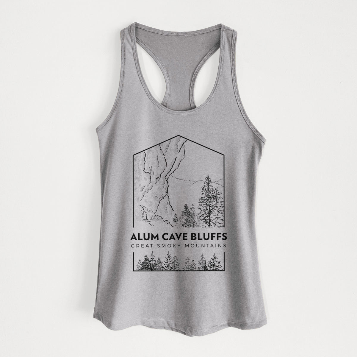 Heather grey women's racerback tank top laid flat, printed with a black line art badge of Alum Cave Bluffs with pine trees, with the words Alum Cave Bluffs, Great Smoky Mountains.