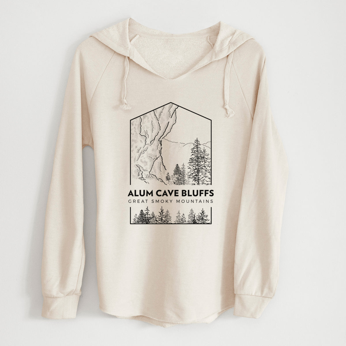 Bone cream women's Cali Wave hooded sweatshirt laid flat, printed with a black line art badge of Alum Cave Bluffs with pine trees, with the words Alum Cave Bluffs, Great Smoky Mountains.