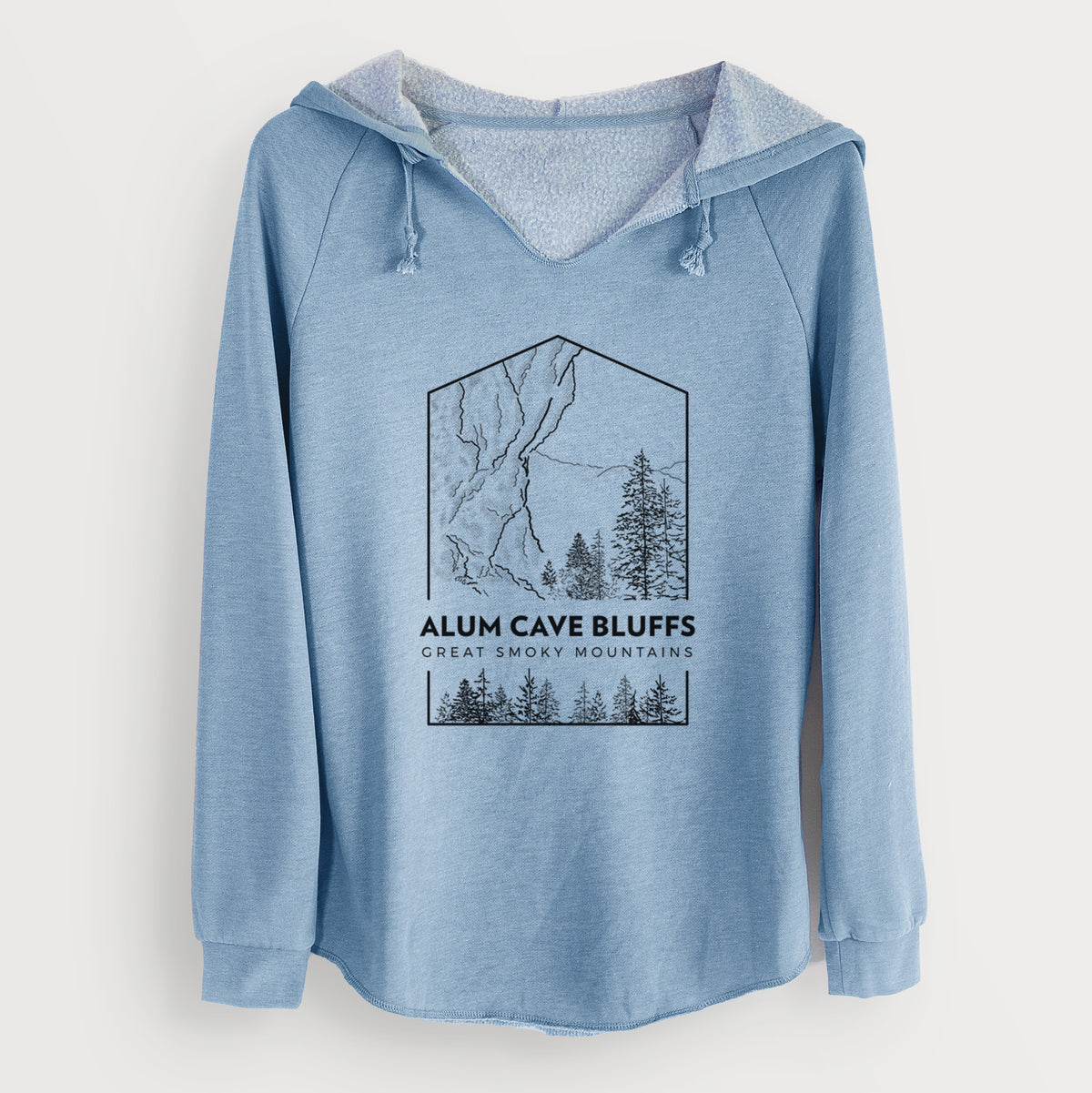 Misty blue women's Cali Wave hooded sweatshirt laid flat, printed with a black line art badge of Alum Cave Bluffs with pine trees, with the words Alum Cave Bluffs, Great Smoky Mountains.