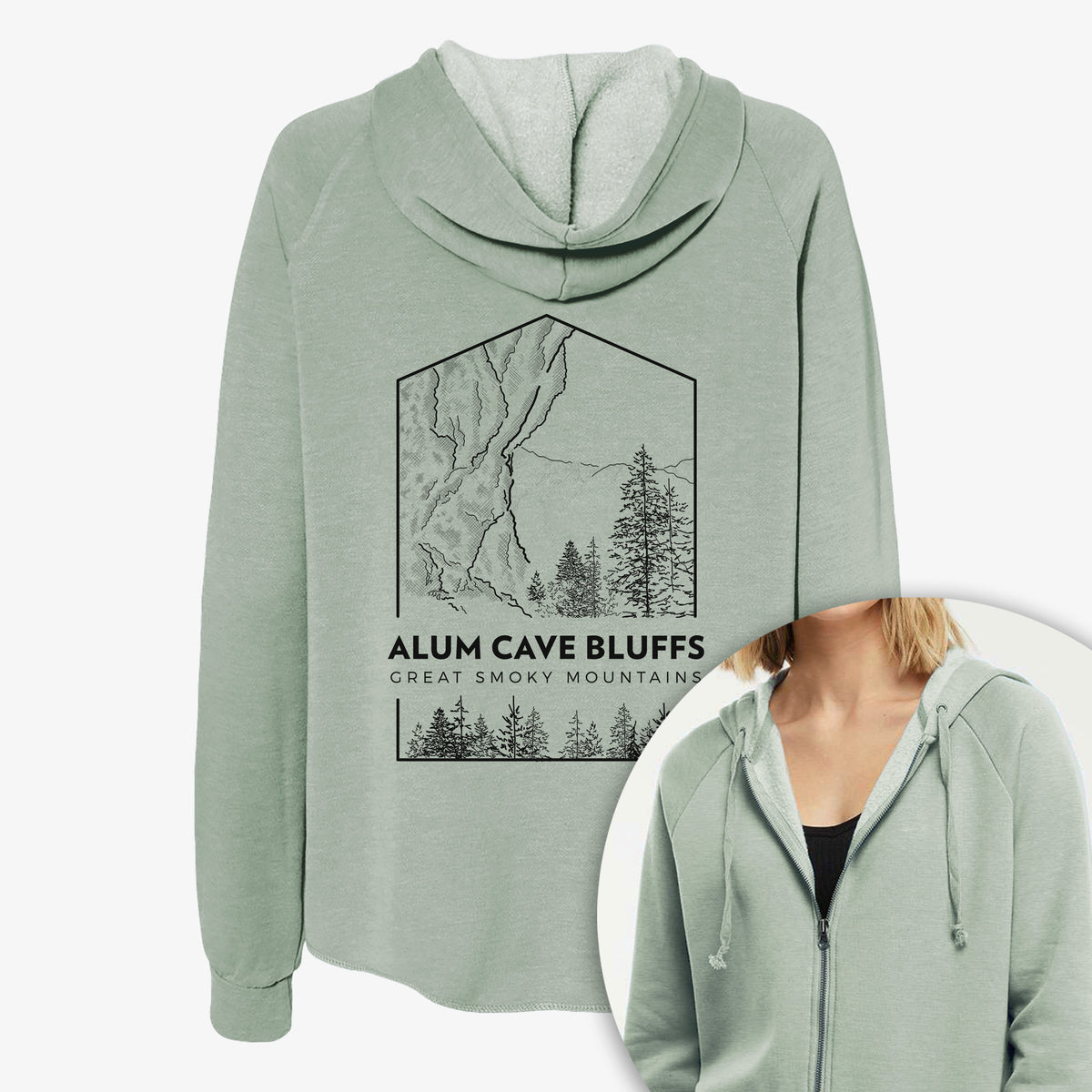 Women's Cali Wave zip-up sweatshirt printed with a black line art badge of Alum Cave Bluffs with pine trees, with the words Alum Cave Bluffs, Great Smoky Mountains, with a close-up of the zipper.