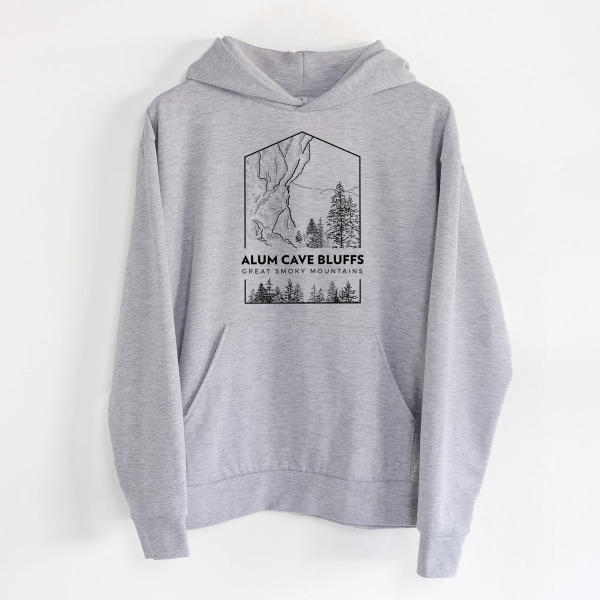 Alum Cave Bluffs - Great Smoky Mountains National Park - Statement Midweight Hoodie in Heather Grey, hanging on a white wall, with a front kangaroo pocket and no drawcords.