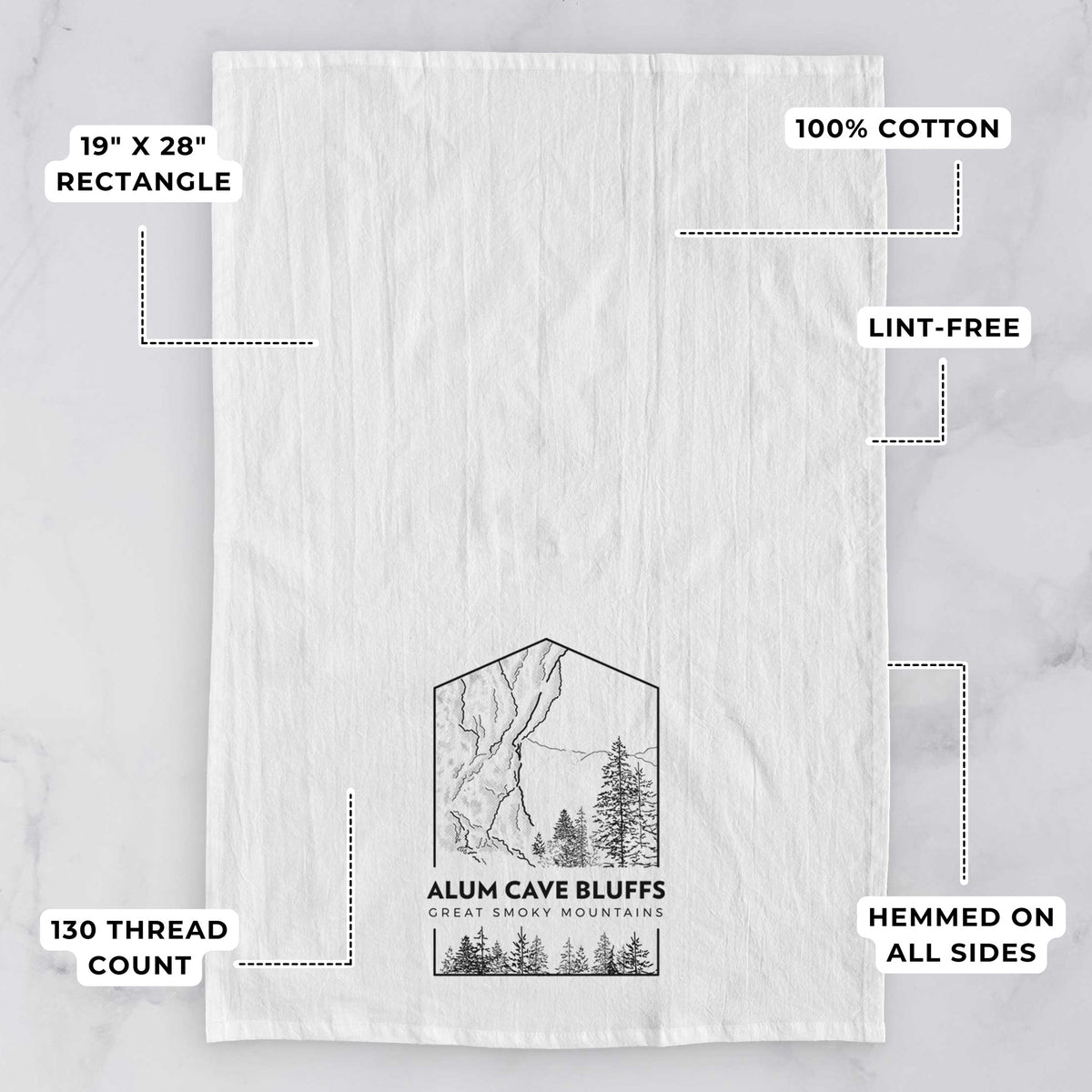 White tea towel printed with a black line art badge of Alum Cave Bluffs with pine trees, with the words Alum Cave Bluffs, Great Smoky Mountains, with feature labels: 19 by 28 inch rectangle, 100% cotton, lint-free, 130 thread count, hemmed on all sides.