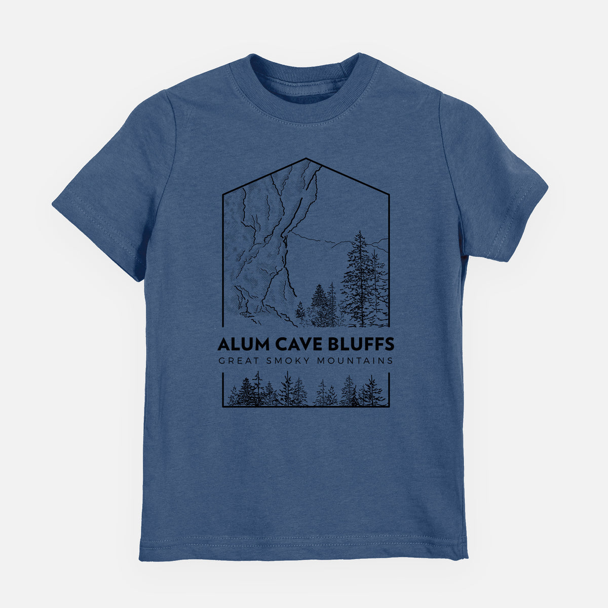 Indigo blue youth t-shirt laid flat, printed with a black line art badge of Alum Cave Bluffs with pine trees, with the words Alum Cave Bluffs, Great Smoky Mountains.
