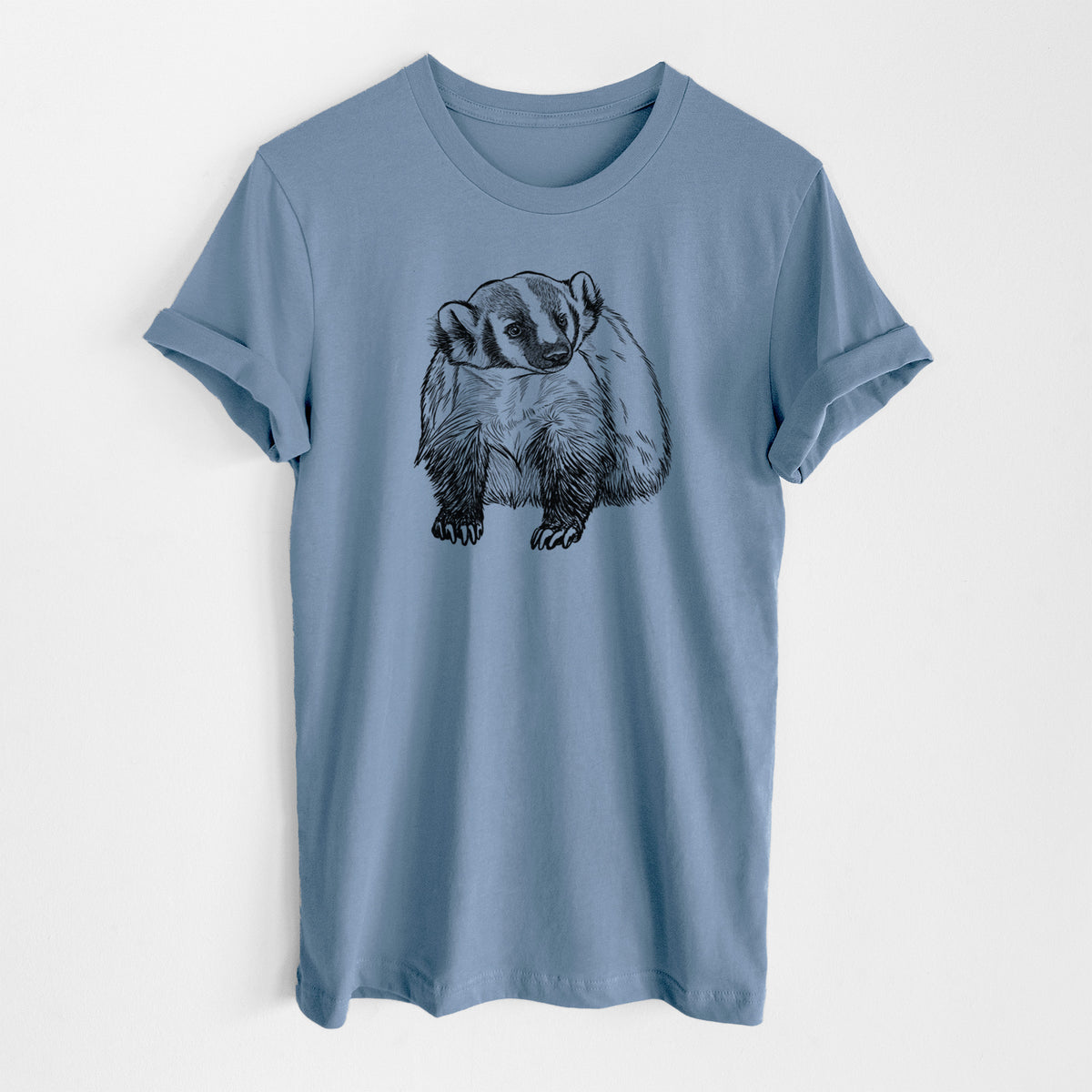 Steel blue lightweight cotton t-shirt laid flat, printed with a detailed black ink illustration of an American badger facing forward.