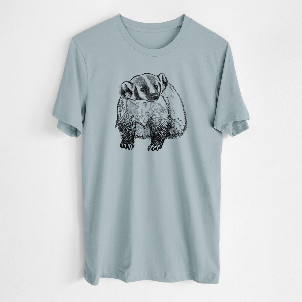 Vintage denim lightweight cotton t-shirt laid flat, printed with a detailed black ink illustration of an American badger facing forward.