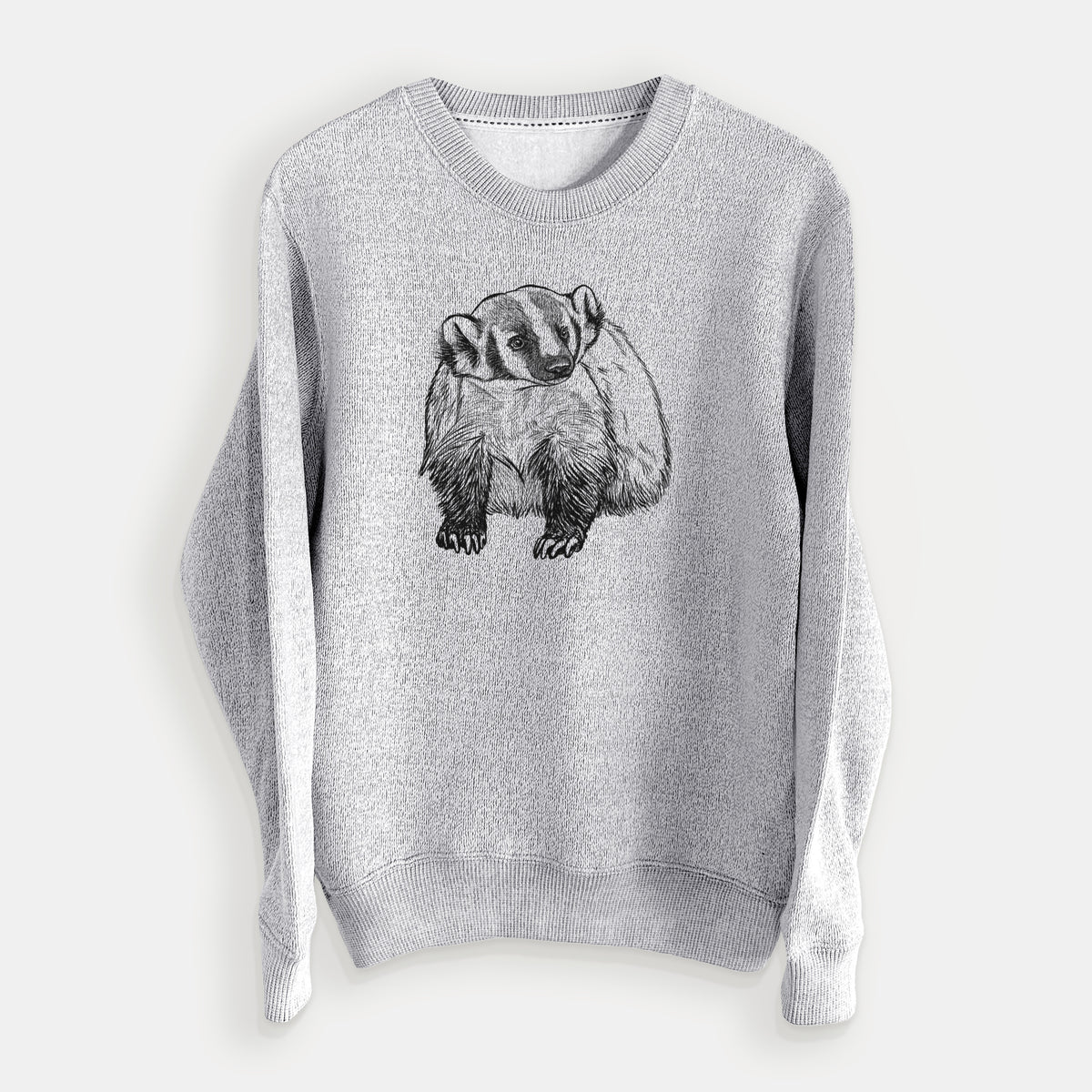 Salt and pepper knit sweatshirt laid flat, printed with a detailed black ink illustration of an American badger facing forward.