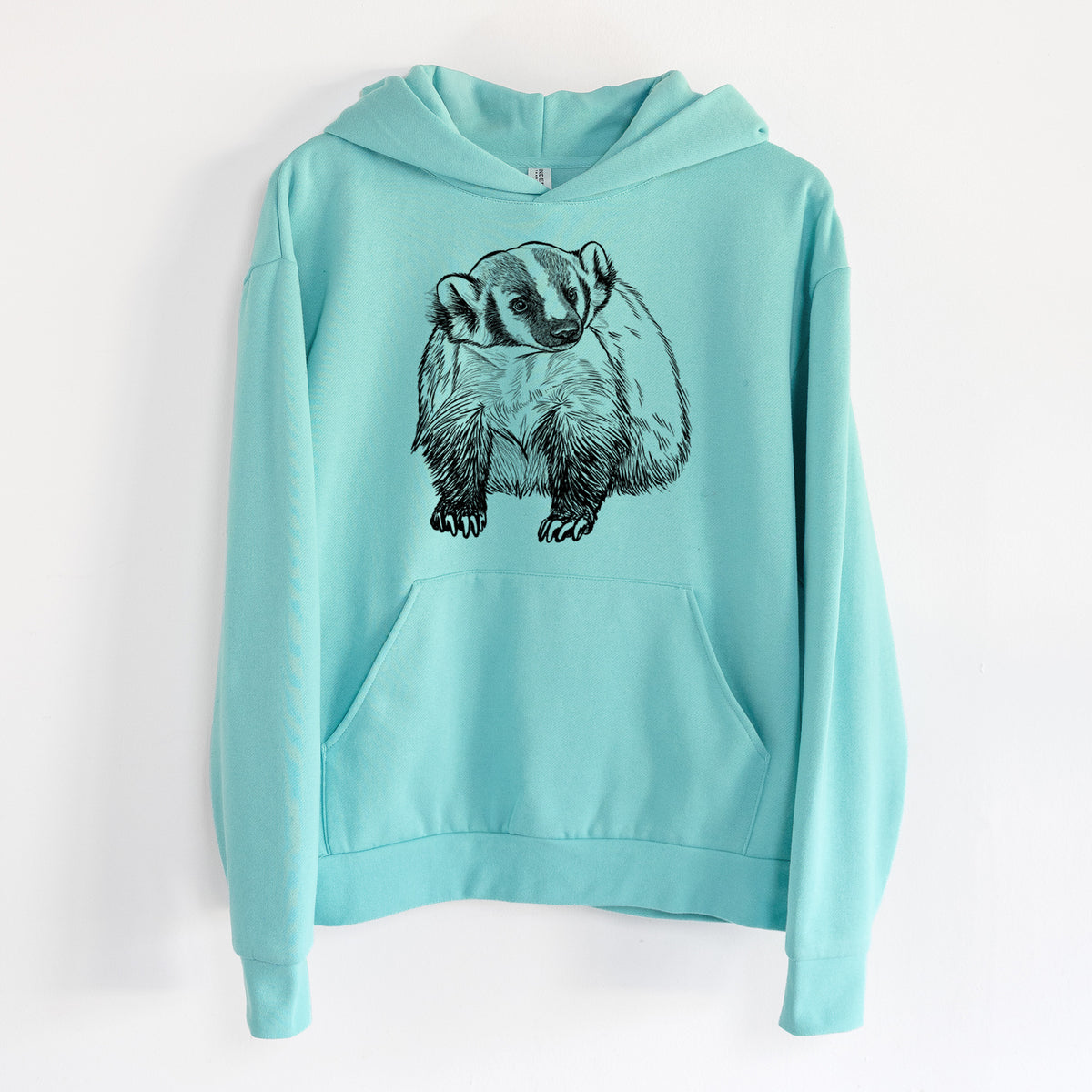 American Badger - Taxidea taxus - Statement Midweight Hoodie in Seafoam, hanging on a white wall, with a front kangaroo pocket and no drawcords.