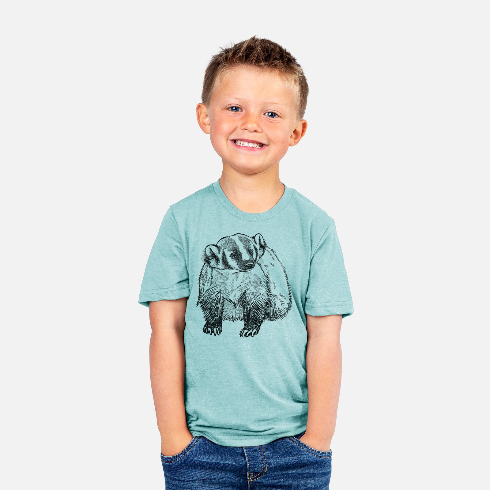 Two youth t-shirts in different colors on hangers, printed with a detailed black ink illustration of an American badger facing forward.