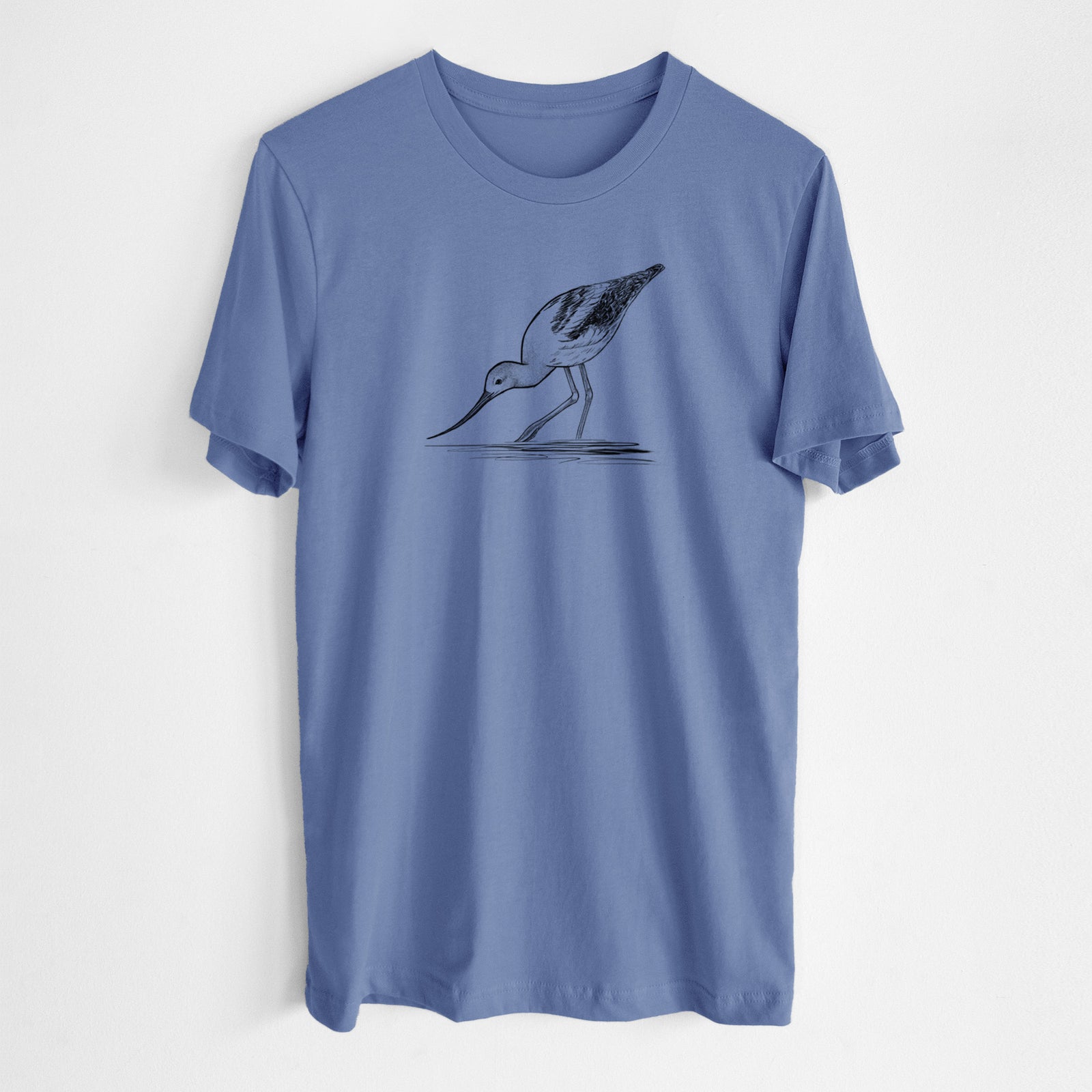Blue bell lightweight cotton t-shirt laid flat, printed with a detailed black ink sketch of an American avocet wading in shallow water.
