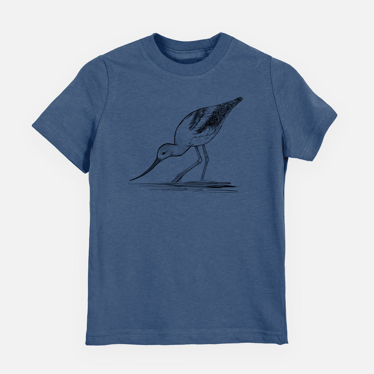 Indigo blue youth t-shirt laid flat, printed with a detailed black ink sketch of an American avocet wading in shallow water.